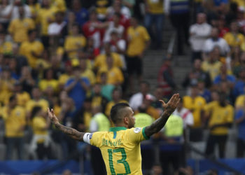 Brazil's Dani Alves celebrates after scoring against Peru during their Copa America football tournament group match at the Corinthians Arena in Sao Paulo, Brazil, on June 22, 2019. (Photo by Miguel SCHINCARIOL / AFP)        (Photo credit should read MIGUEL SCHINCARIOL/AFP/Getty Images)