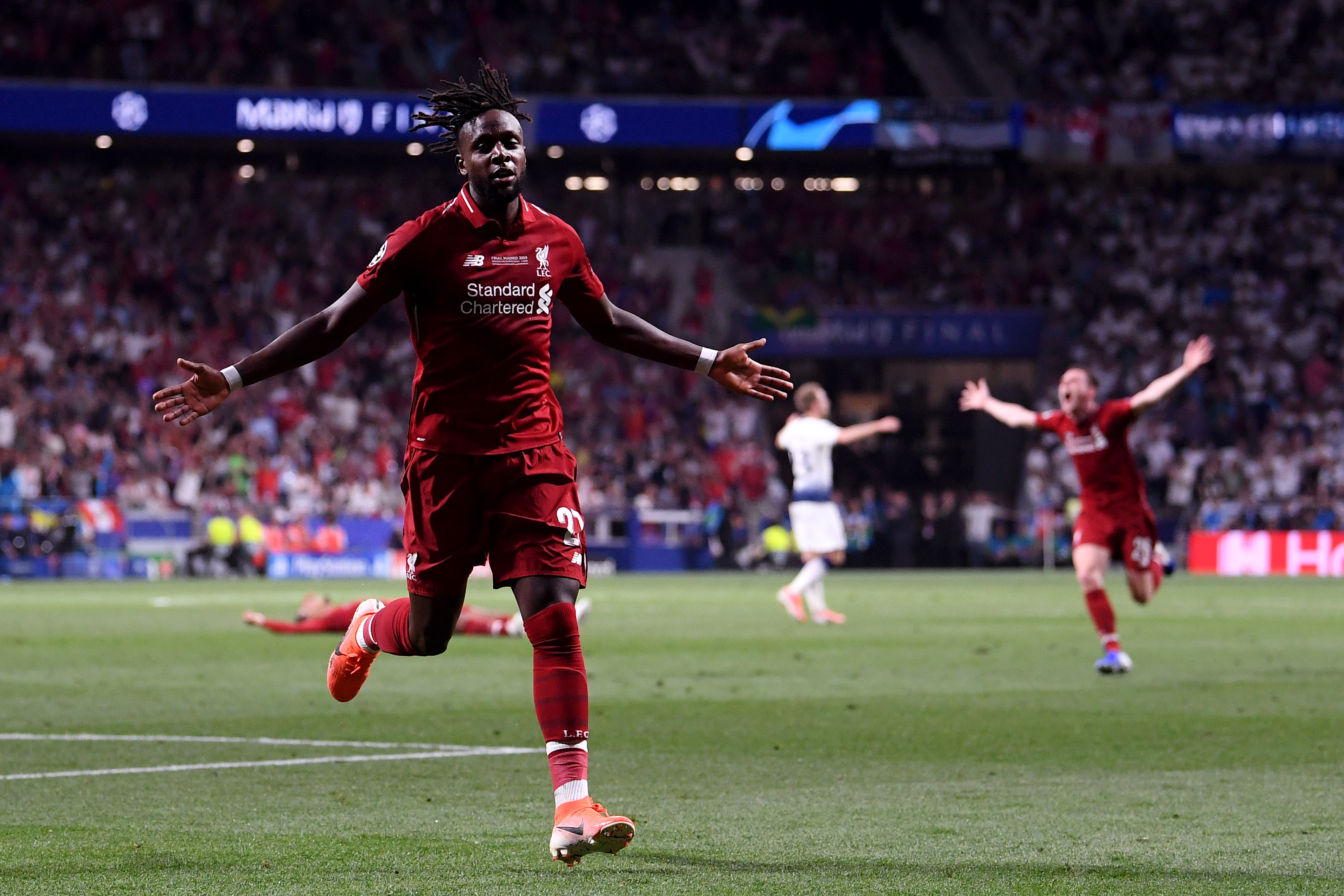 MADRID, SPAIN - JUNE 01: Divock Origi of Liverpool celebrates after scoring his team's second goal during the UEFA Champions League Final between Tottenham Hotspur and Liverpool at Estadio Wanda Metropolitano on June 01, 2019 in Madrid, Spain. (Photo by Laurence Griffiths/Getty Images)