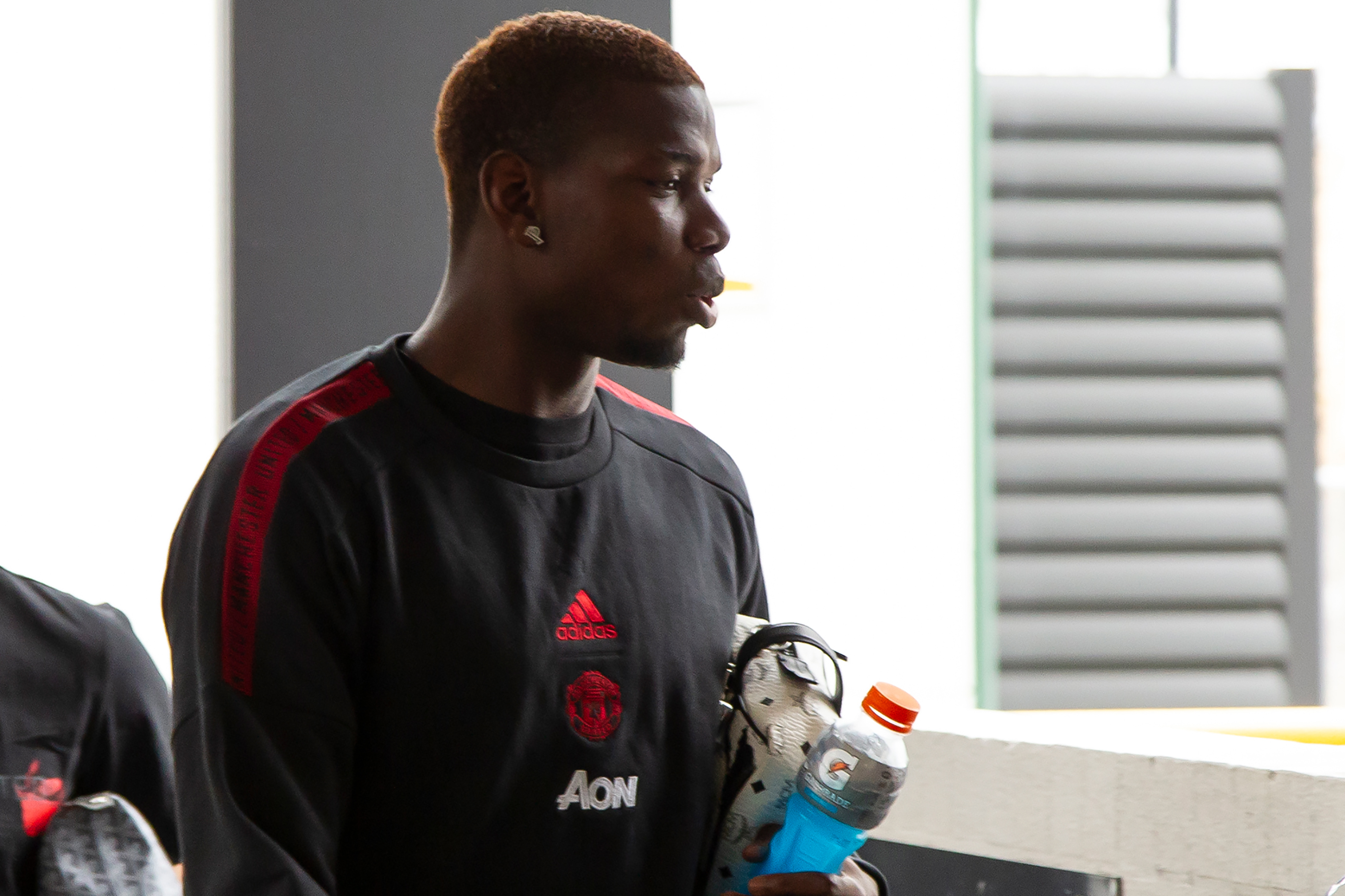 Manchester United's Paul Pogba leaves the pitch after training for their pre-season friendly football matches against Perth Glory and Leeds United at Optus Stadium in Perth on  July 10, 2019. (Photo by Tony ASHBY / AFP) / -- IMAGE RESTRICTED TO EDITORIAL USE - STRICTLY NO COMMERCIAL USE --        (Photo credit should read TONY ASHBY/AFP/Getty Images)