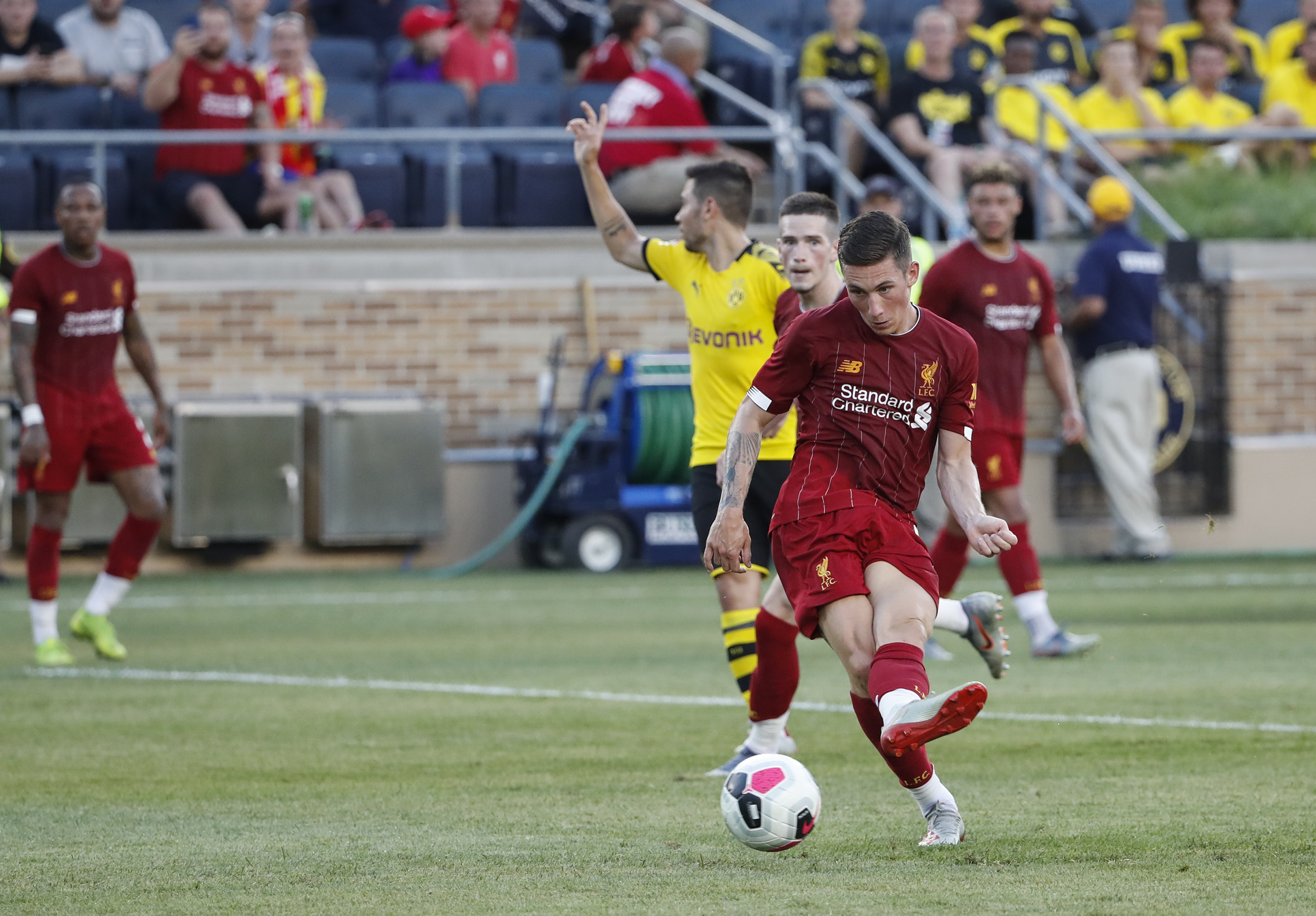 Liverpool midfielder Harry Wilson kicks to score against Borussia Dortmund during the first half of the international friendly match at Notre Dame Stadium in South Bend, Indiana, July 19, 2019. (Photo by KAMIL KRZACZYNSKI / AFP)        (Photo credit should read KAMIL KRZACZYNSKI/AFP/Getty Images)
