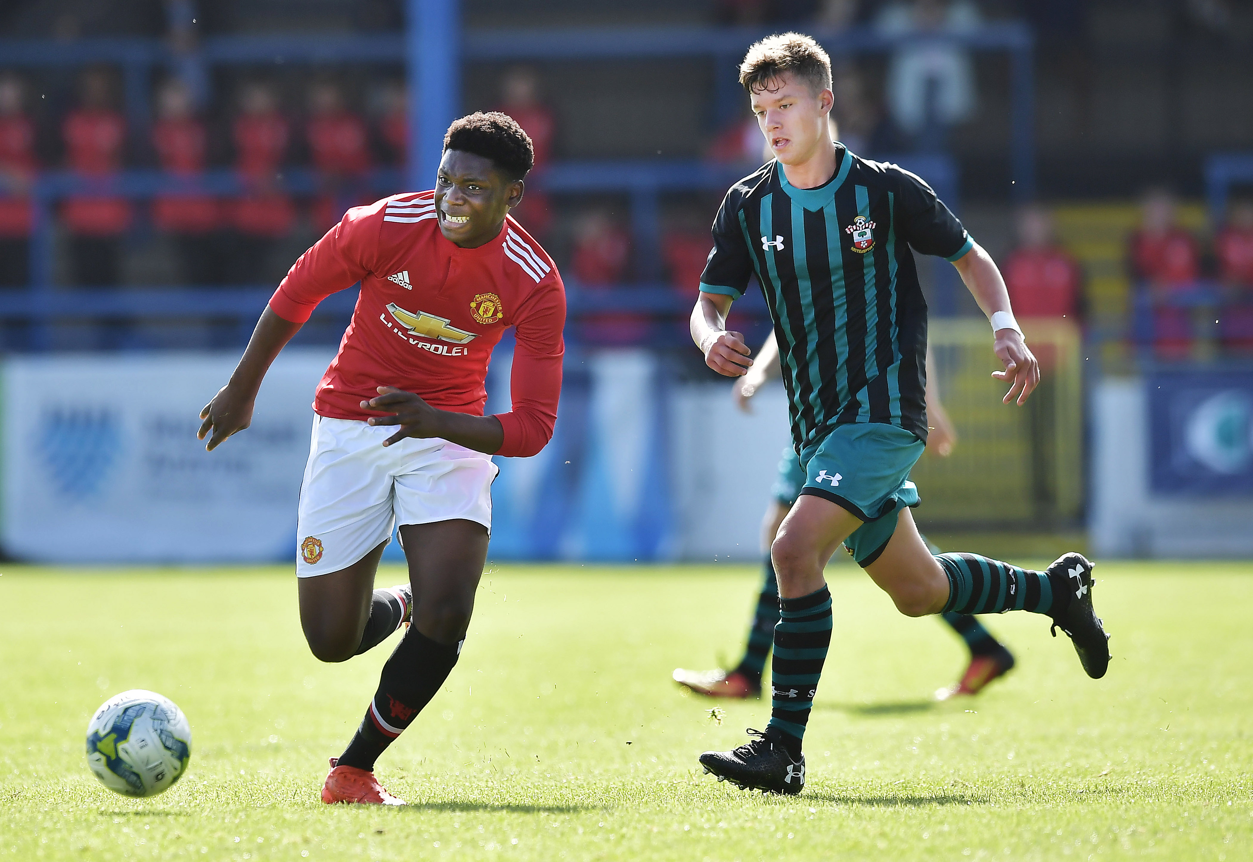 COLERAINE, NORTHERN IRELAND - JULY 26: Ademipo Odubeko (L) of Manchester United and Jack Turner (R) of Southampton during the Super Cup NI tournament group game between Manchester United u16's and Southampton u16's at the Showgrounds on July 26, 2017 in Coleraine, Northern Ireland. (Photo by Charles McQuillan/Getty Images)