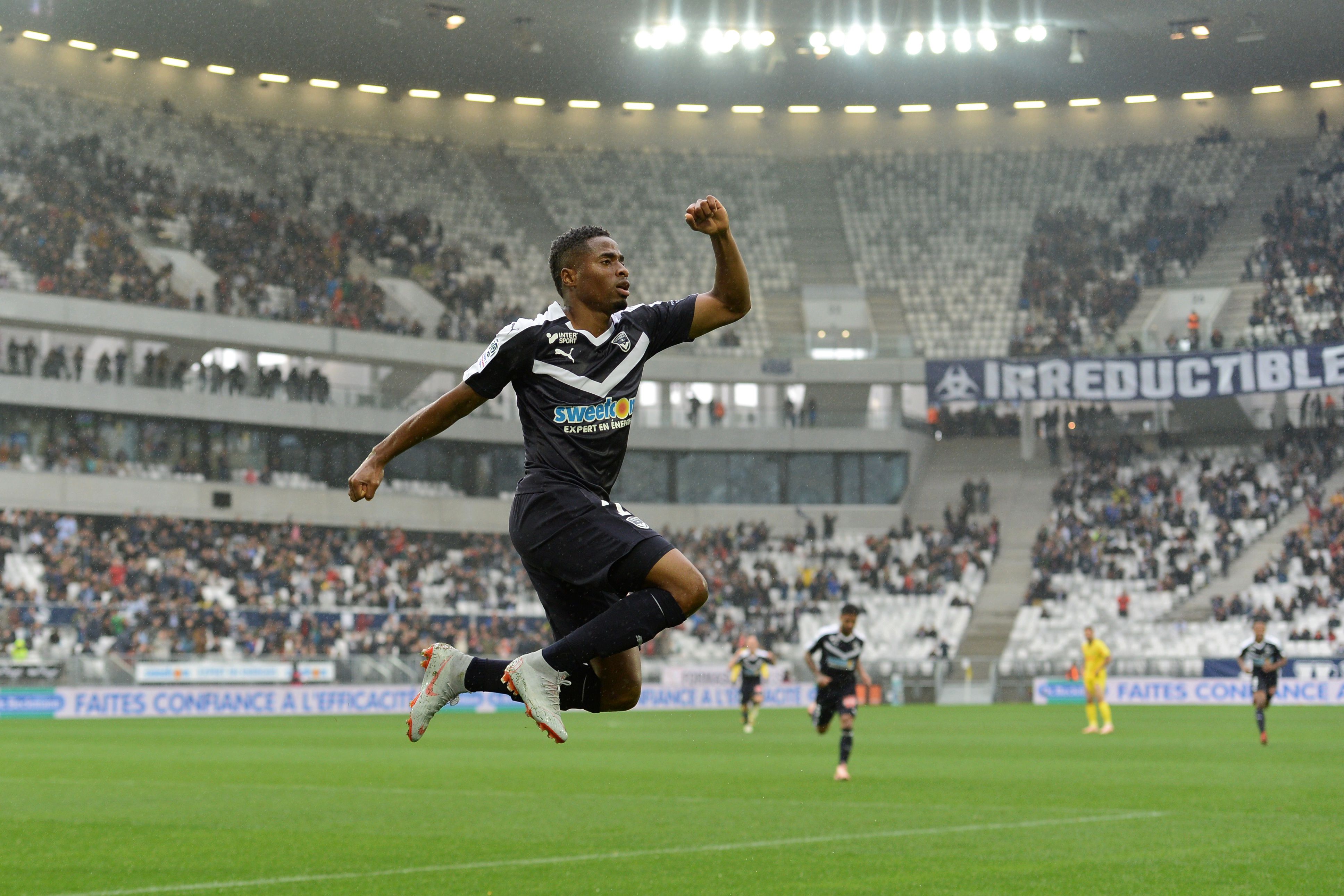 Bordeaux's Guinean forward Francois Kamano celebrates after scoring during the French Ligue 1 football match between Bordeaux and Nantes in Bordeaux, southwestern France on October 7, 2018. (Photo by NICOLAS TUCAT / AFP)        (Photo credit should read NICOLAS TUCAT/AFP/Getty Images)