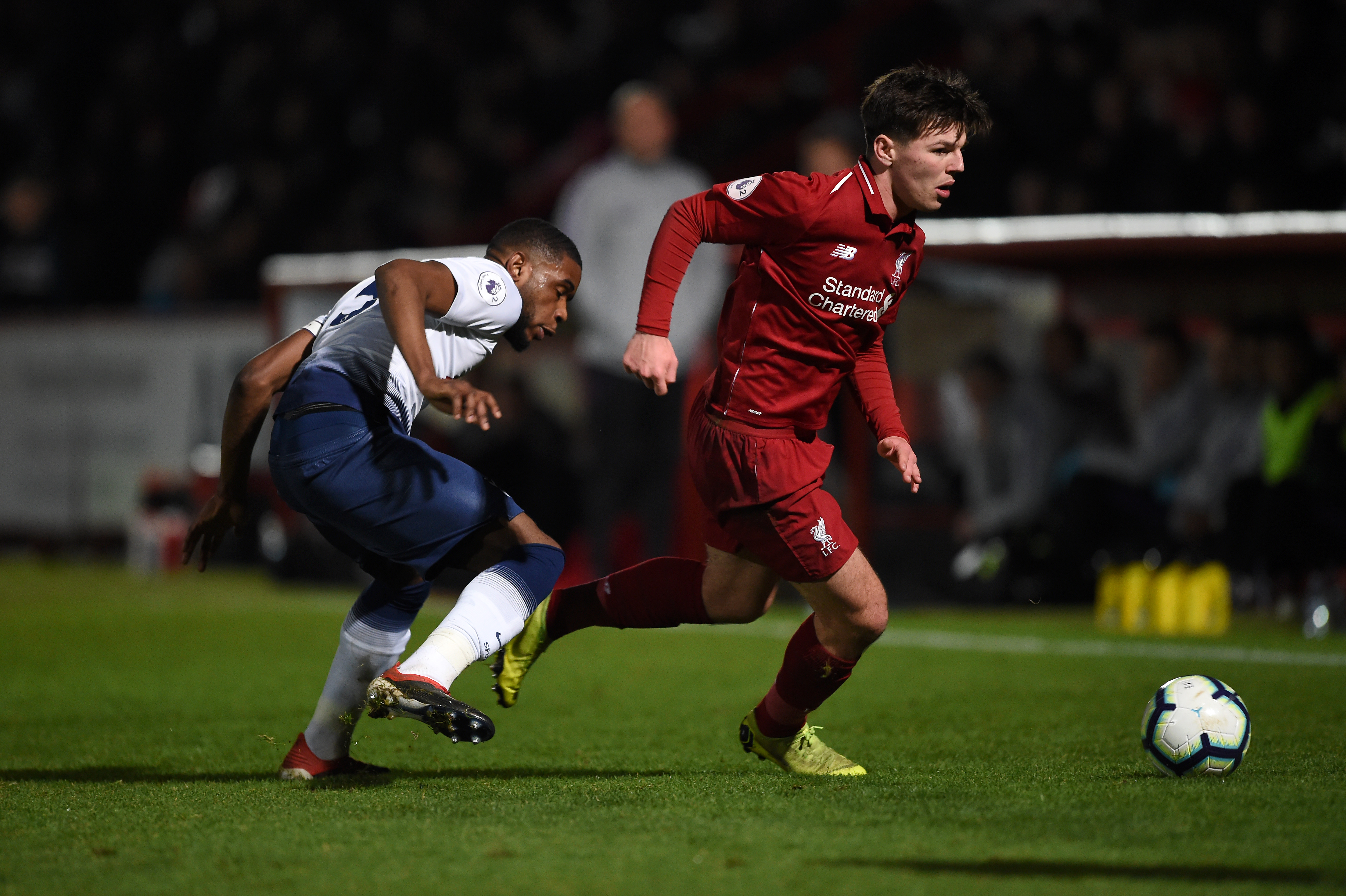 STEVENAGE, ENGLAND - JANUARY 07: Bobby Duncan of Liverpool is challenged by Japhet Tanganga of Tottenham Hotspur during the Premier League 2 match between Tottenham Hotspur and Liverpool at The Lamex Stadium on January 07, 2019 in Stevenage, England. (Photo by Harriet Lander/Getty Images)