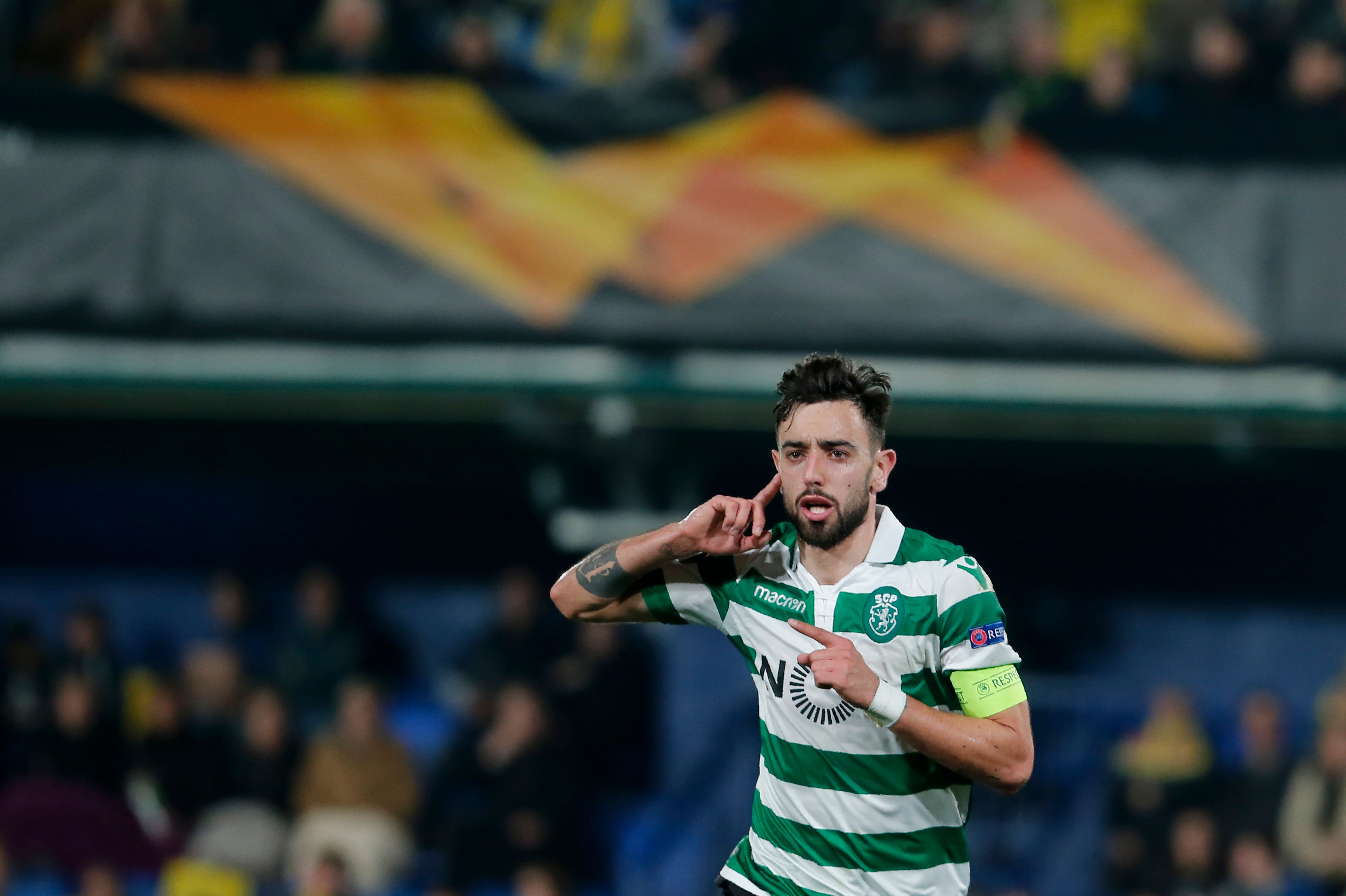 Sporting's Portuguese midfielder Bruno Fernandes celebrates after scoring during the UEFA Europa League round of 32 second leg football match between Villarreal CF and Sporting CP at the Ceramica stadium in Villarreal on February 21, 2019. (Photo by PAU BARRENA / AFP)        (Photo credit should read PAU BARRENA/AFP/Getty Images)