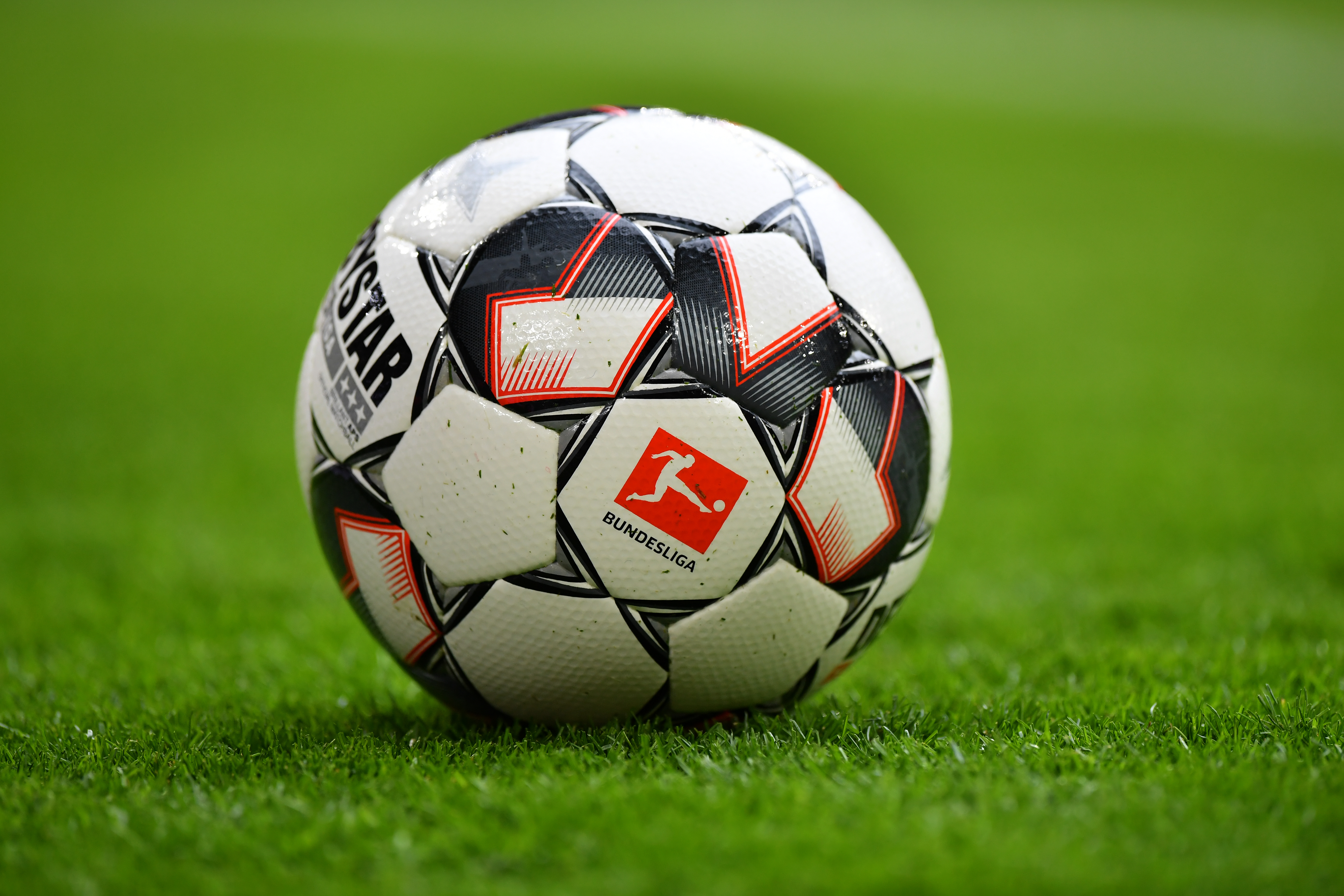 MUNICH, GERMANY - MARCH 09: The Bundesliga logo is seen on a match ball during the Bundesliga match between FC Bayern Muenchen and VfL Wolfsburg at Allianz Arena on March 09, 2019 in Munich, Germany. (Photo by Sebastian Widmann/Bongarts/Getty Images)