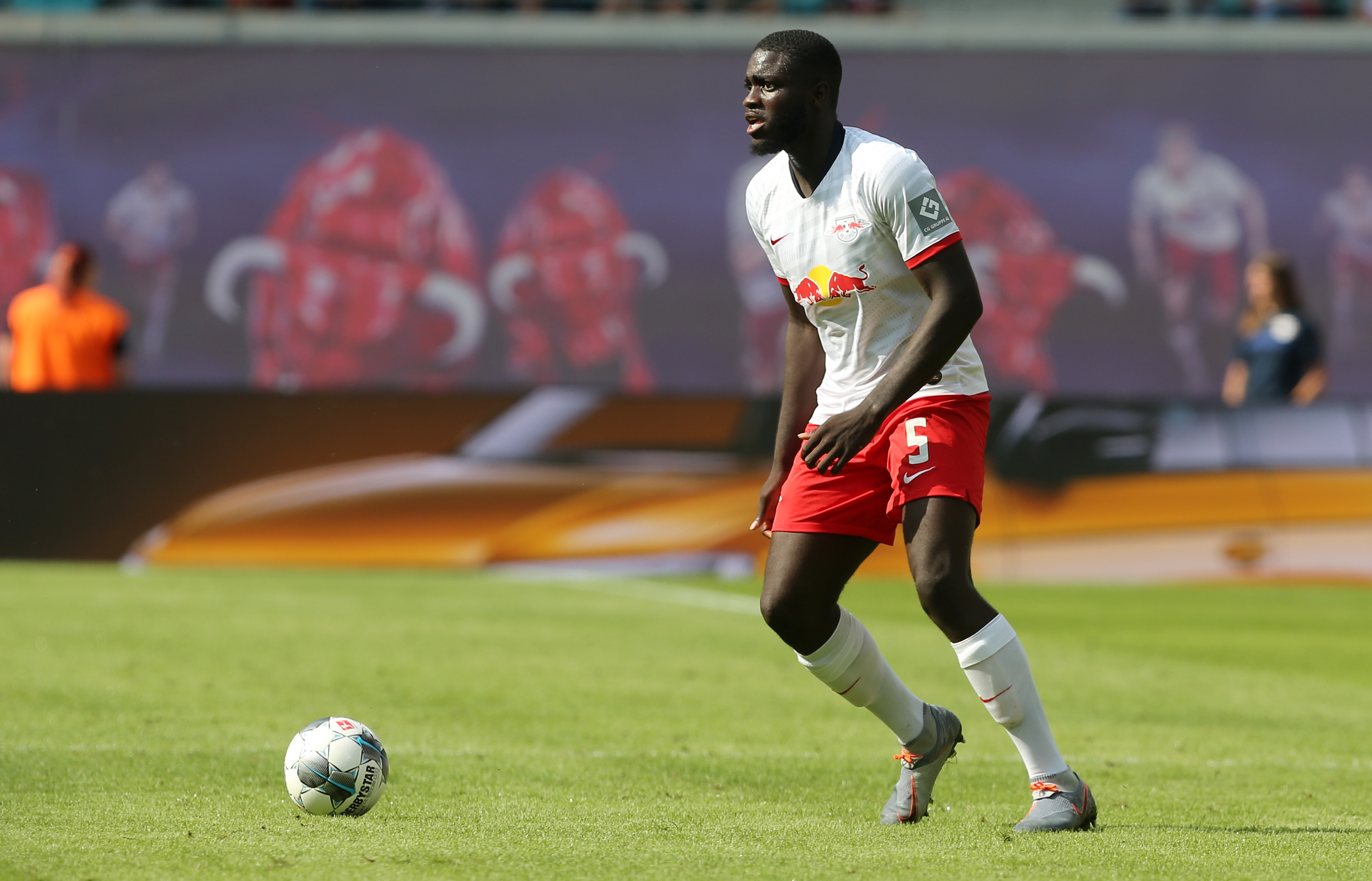 LEIPZIG, GERMANY - AUGUST 03:  Dayot Upamecano of Leipzig runs with the ball during the pre-season friendly match between RB Leipzig and Aston Villa at Red Bull Arena on August 3, 2019 in Leipzig, Germany.  (Photo by Matthias Kern/Bongarts/Getty Images)