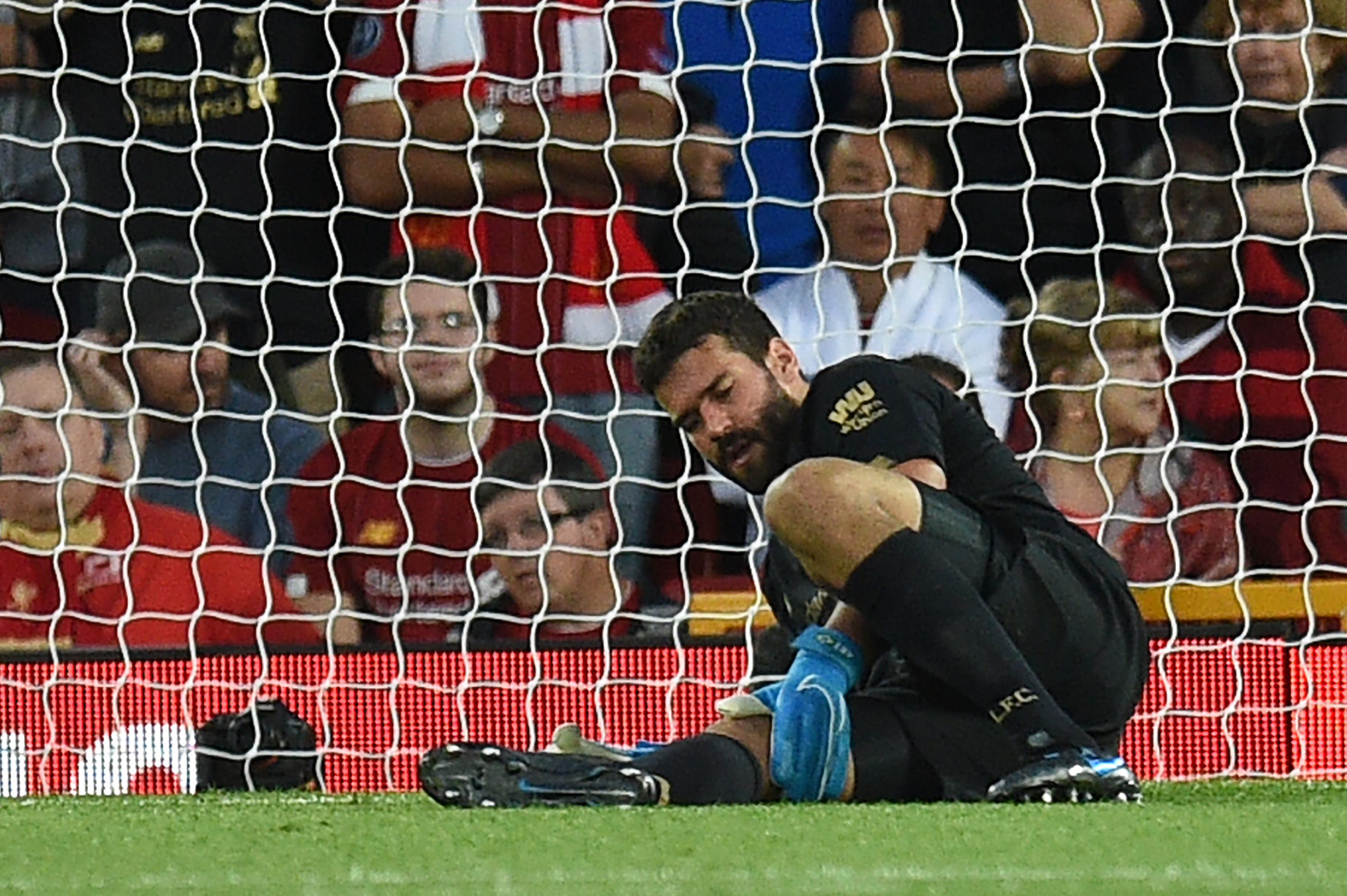 Liverpool fans will be sweating over Alisson's fitness. (Photo by Oli Scarff/AFP/Getty Images)