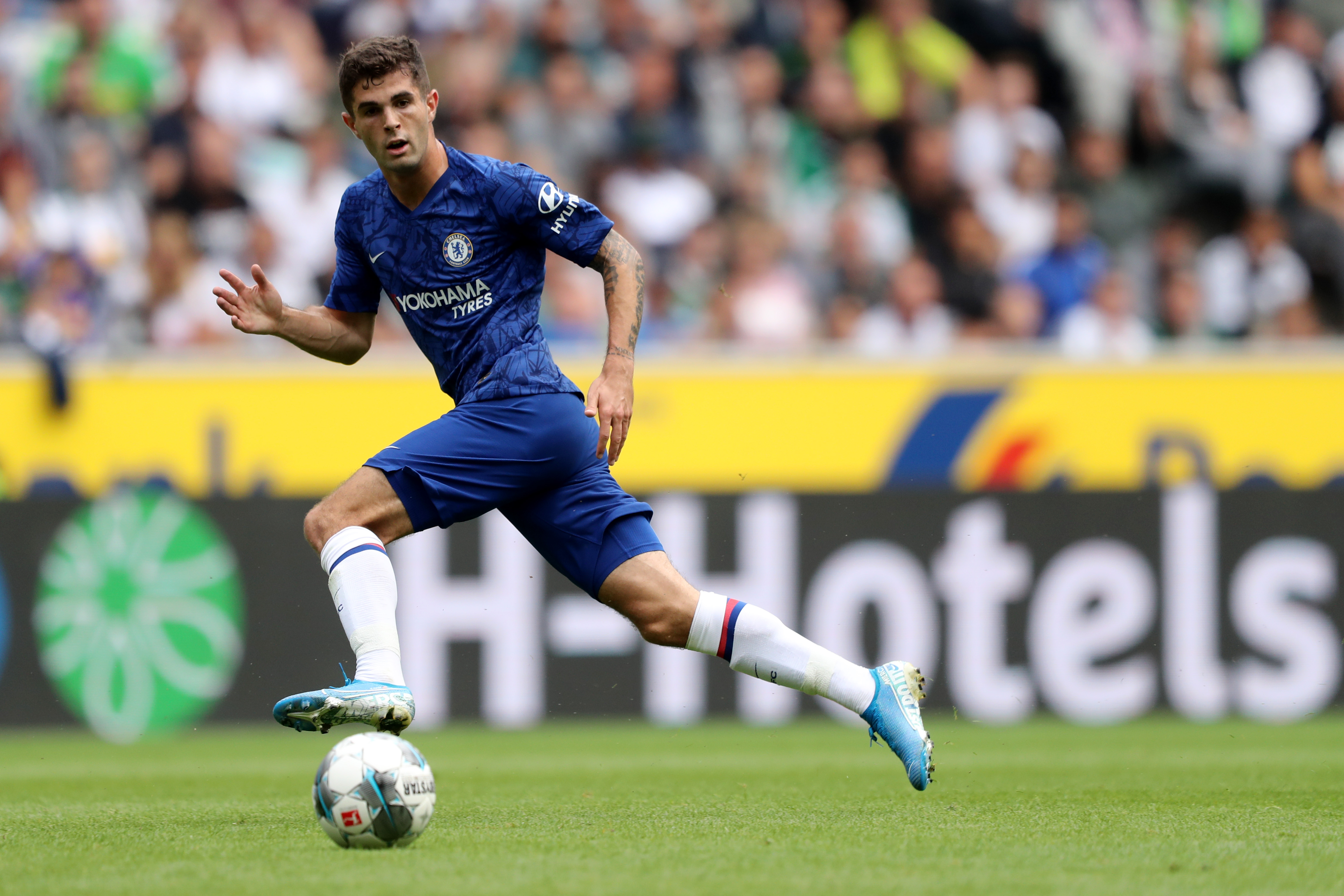 MOENCHENGLADBACH, GERMANY - AUGUST 03: Christian Pulisic of Chelsea runs with the ball during the pre-season friendly match between Borussia Moenchengladbach and FC Chelsea at Borussia-Park on August 03, 2019 in Moenchengladbach, Germany. The match between Moenchengladbach and Chelsea ended 2-2.  (Photo by Christof Koepsel/Bongarts/Getty Images)