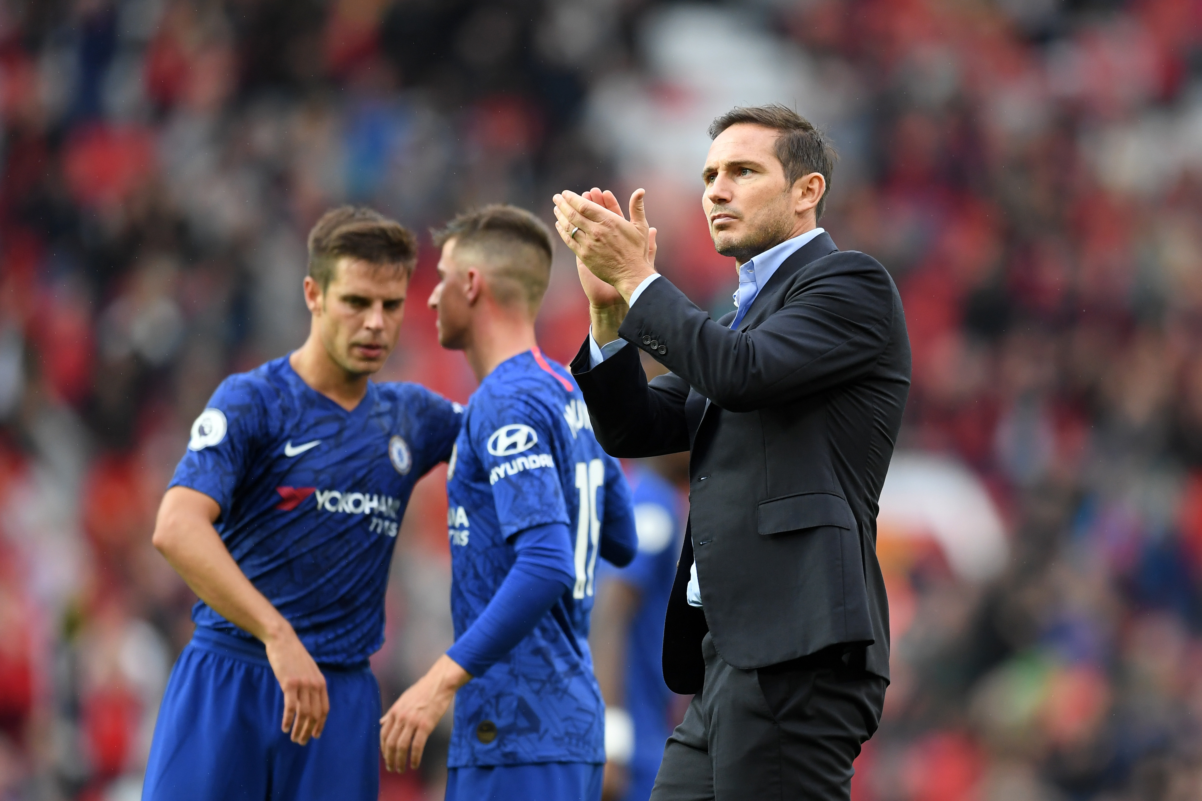 MANCHESTER, ENGLAND - AUGUST 11: Frank Lampard, Manager of Chelsea acknowledges the fans following his teams defeat in the Premier League match between Manchester United and Chelsea FC at Old Trafford on August 11, 2019 in Manchester, United Kingdom. (Photo by Michael Regan/Getty Images)