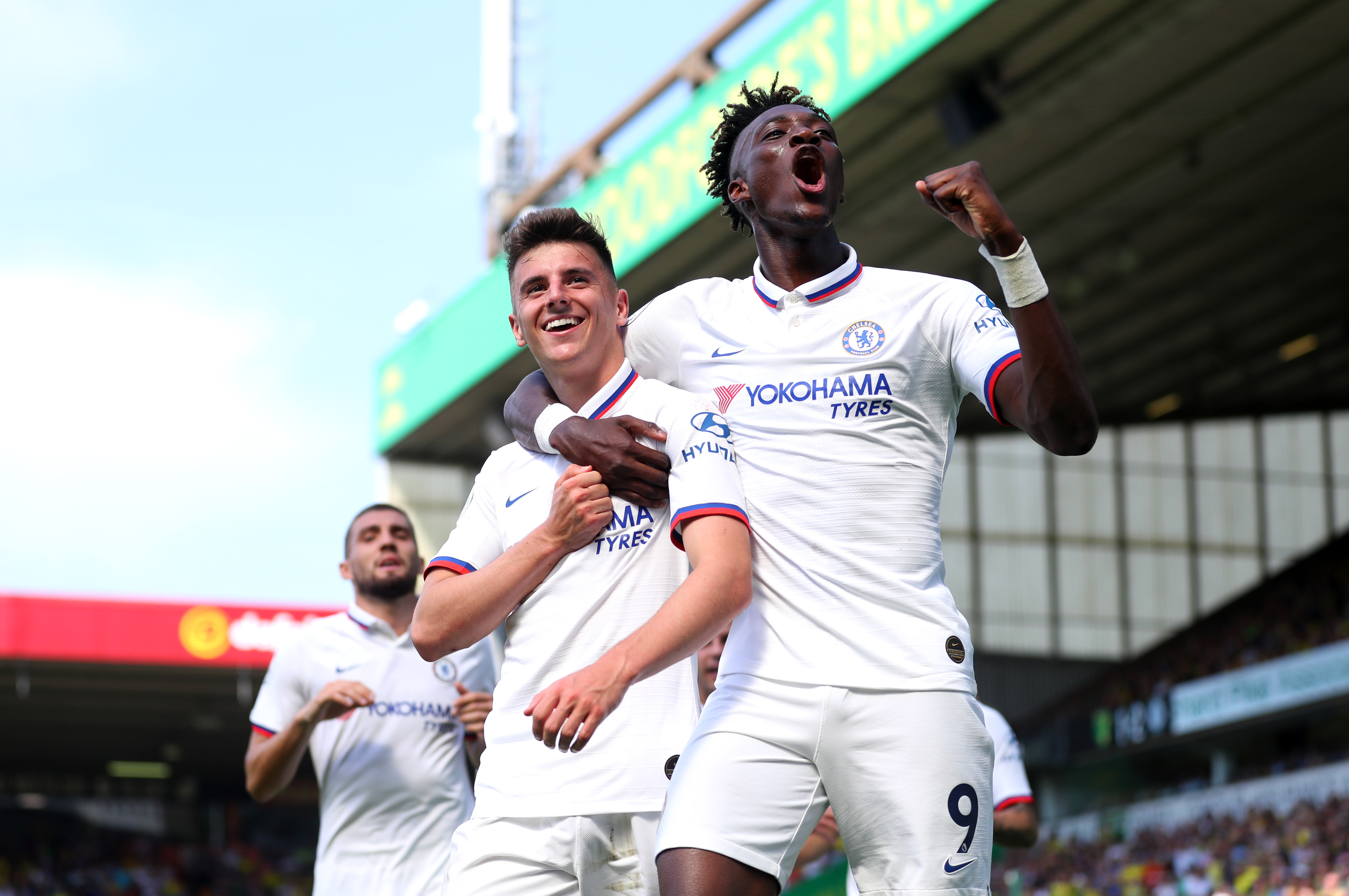 NORWICH, ENGLAND - AUGUST 24: Mason Mount and Tammy Abraham of Chelsea celebrates after scoring their team's second goal during the Premier League match between Norwich City and Chelsea FC at Carrow Road on August 24, 2019 in Norwich, United Kingdom. (Photo by Catherine Ivill/Getty Images)