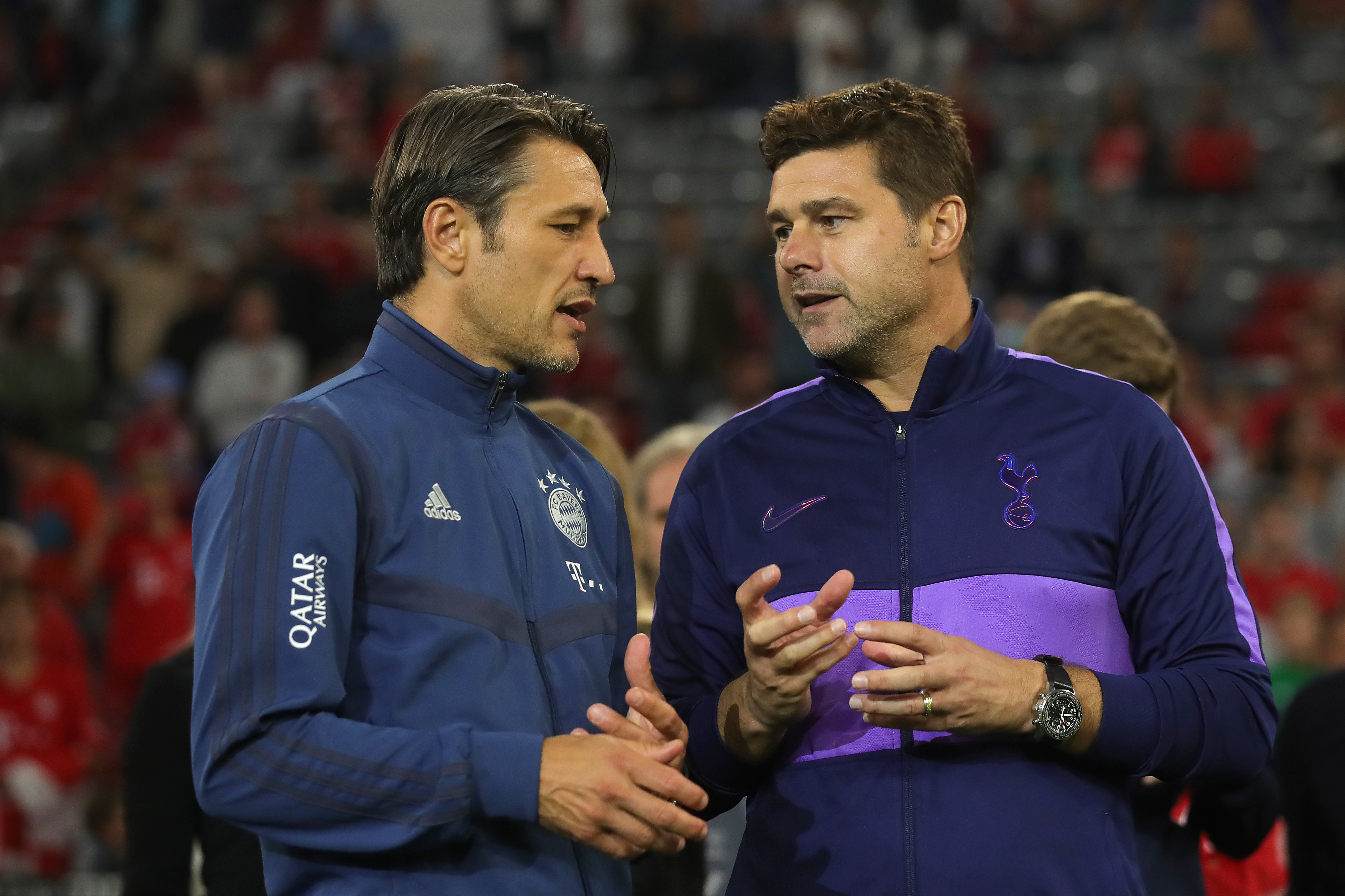 MUNICH, GERMANY - JULY 31: Niko Kovac, head coach of Muenchen talks to Mauricio Pochettino, head coach of Tottenham during the Audi Cup 2019 final match between Tottenham Hotspur and Bayern Muenchen at Allianz Arena on July 31, 2019 in Munich, Germany. (Photo by Alexander Hassenstein/Getty Images for AUDI)