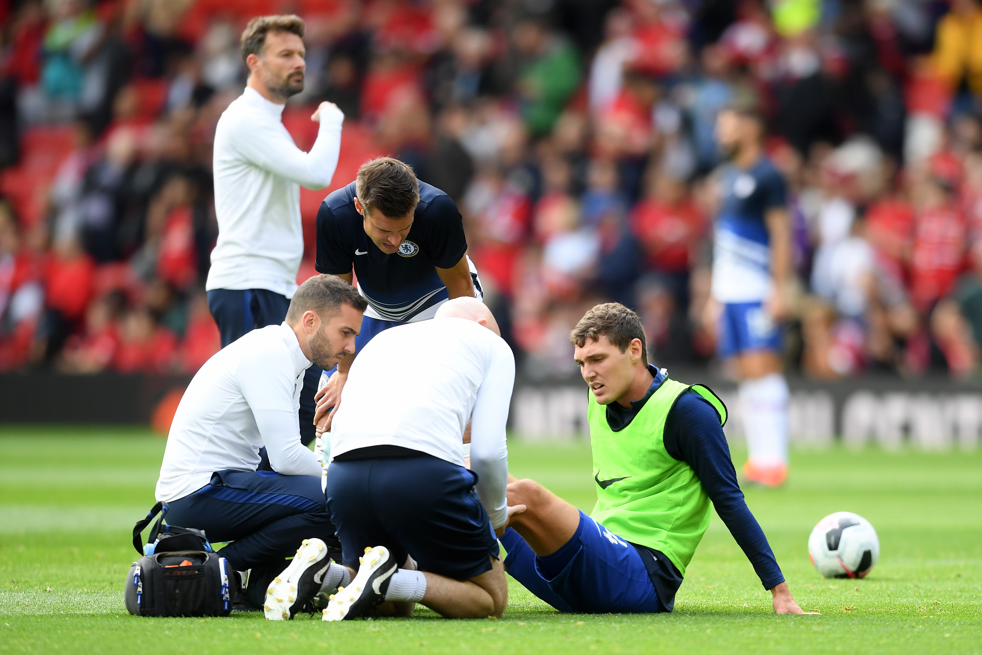 MANCHESTER, ENGLAND - AUGUST 11: Andreas Christensen of Chelsea receives medical treatment ahead of the Premier League match between Manchester United and Chelsea FC at Old Trafford on August 11, 2019 in Manchester, United Kingdom. (Photo by Michael Regan/Getty Images)
