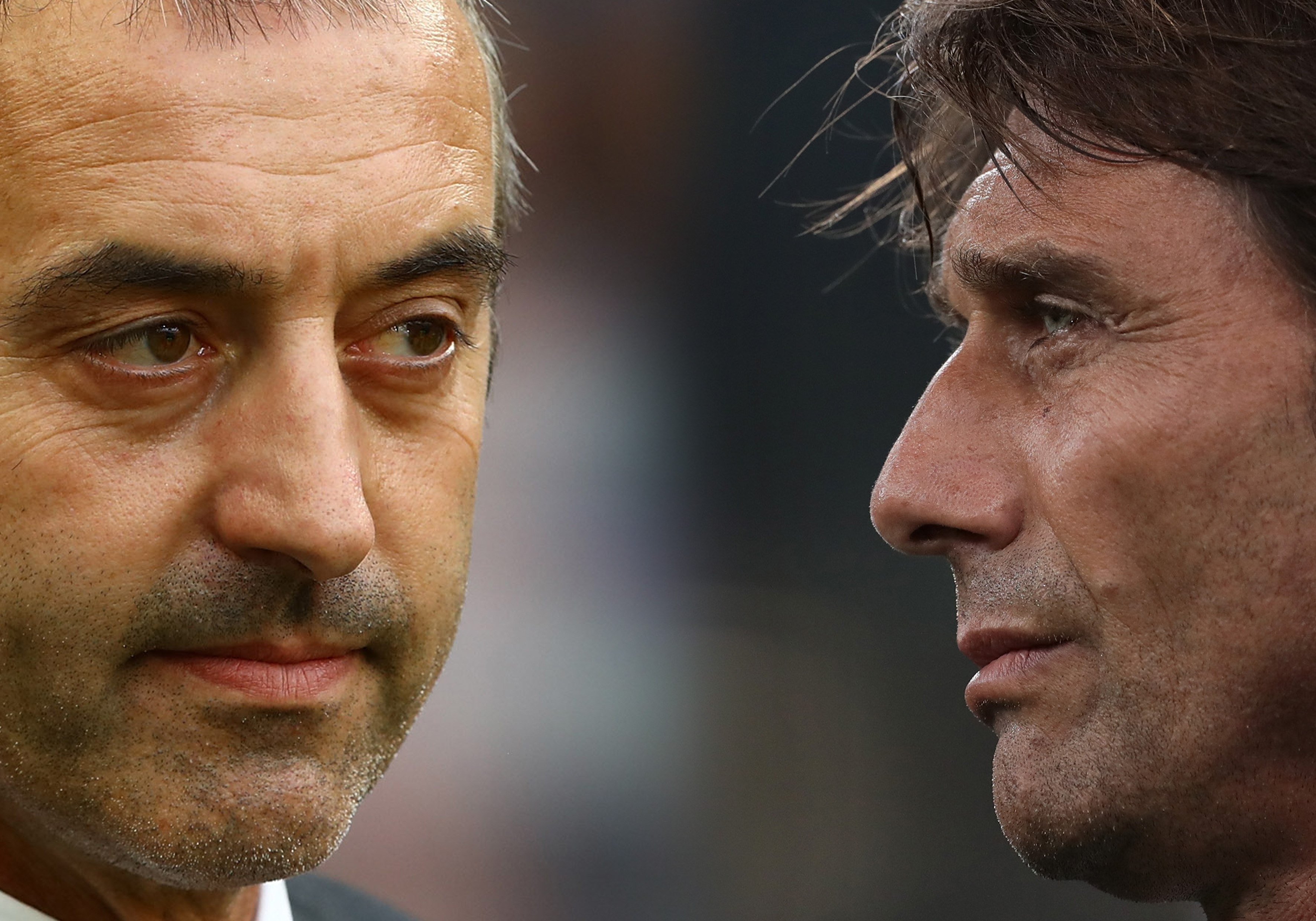 FILE PHOTO (EDITORS NOTE: COMPOSITE OF IMAGES - Image numbers 1171870102,1168235236 - GRADIENT ADDED) In this composite image a comparison has been made between AC Milan coach Marco Giampaolo (L) and FC Internazionale coach Antonio Conte.  AC Milan and  FC Internazionale meet in the "Milan Derby"  at the San Siro Stadium on September 21, 2019 in Milan,Italy.   ***LEFT IMAGE***  MILAN, ITALY - AUGUST 31: AC Milan coach Marco Giampaolo looks on before the Serie A match between AC Milan and Brescia Calcio at Stadio Giuseppe Meazza on September 1, 2019 in Milan, Italy. (Photo by Marco Luzzani/Getty Images) ***RIGHT IMAGE***  MILAN, ITALY - SEPTEMBER 14: FC Internazionale coach Antonio Conte looks on during the Serie A match between FC Internazionale and Udinese Calcio at Stadio Giuseppe Meazza on September 14, 2019 in Milan, Italy. (Photo by Emilio Andreoli/Getty Images)