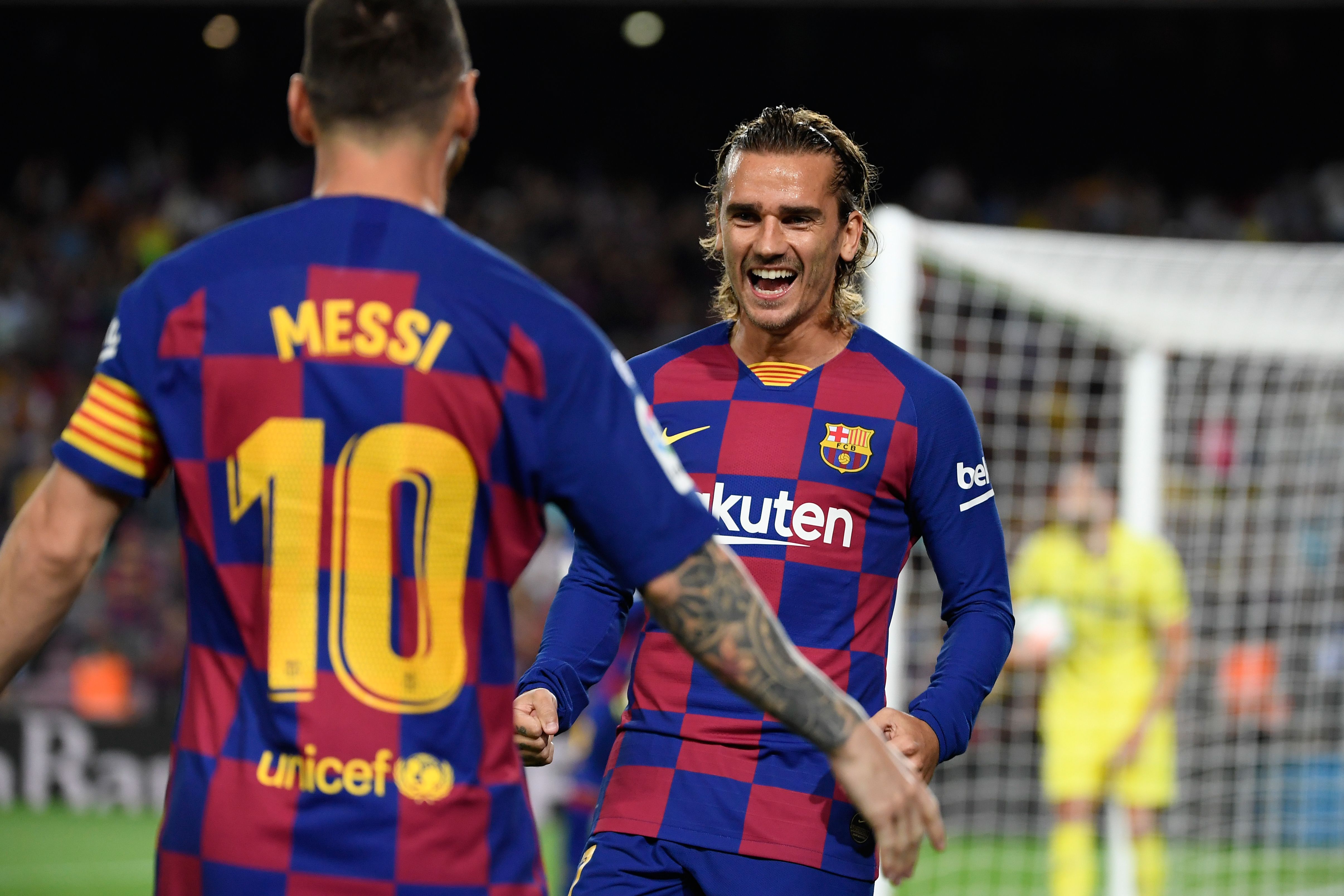 Messi and Griezmann combined for Barcelona's opener (Photo by LLUIS GENE/AFP/Getty Images)
