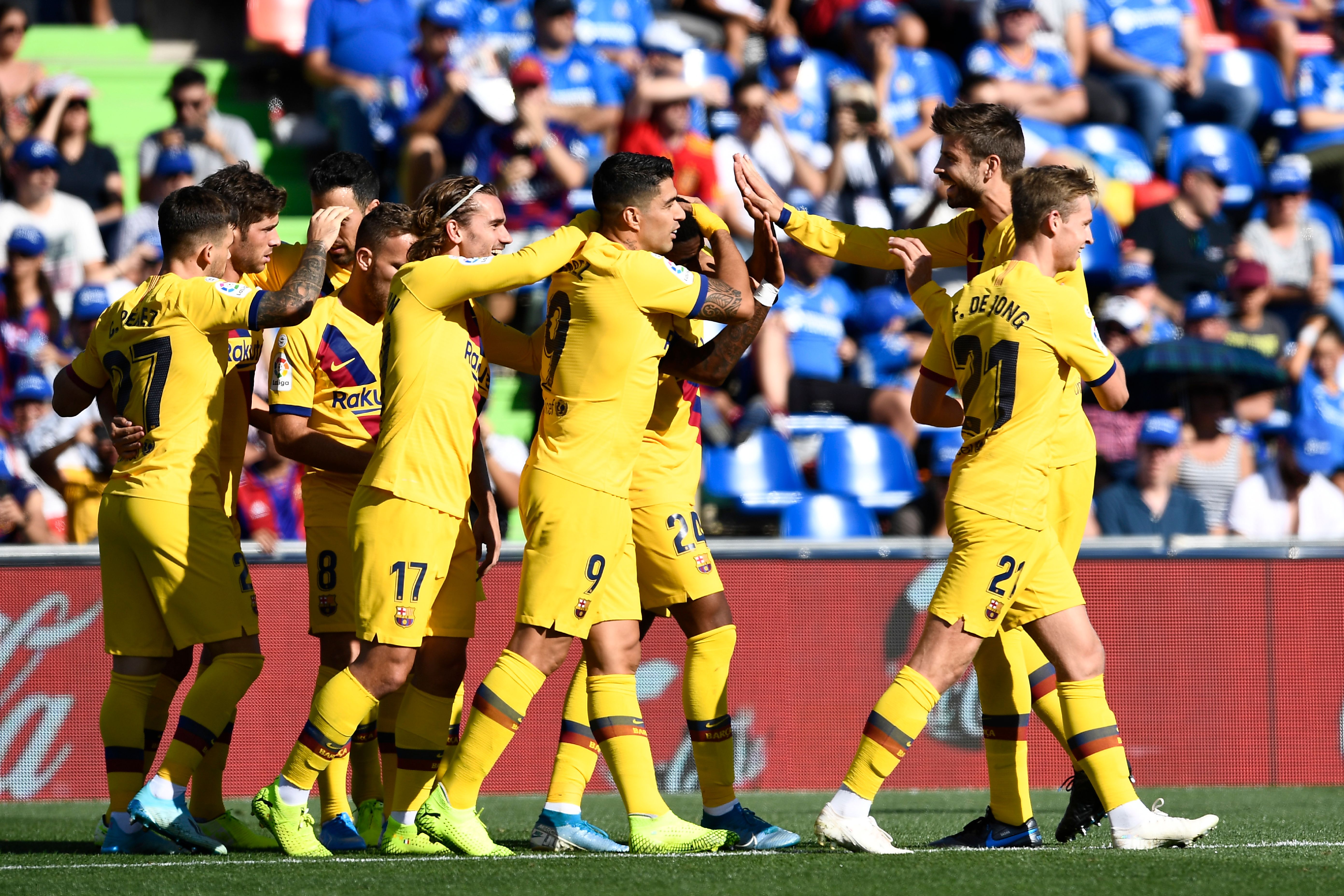 Barcelona's Spanish defender Junior Firpo (3R) celebrates with teammates after scoring a goal during the Spanish league football match between Getafe CF and FC Barcelona at the Col. Alfonso Perez stadium in Getafe on September 28, 2019. (Photo by OSCAR DEL POZO / AFP)        (Photo credit should read OSCAR DEL POZO/AFP/Getty Images)