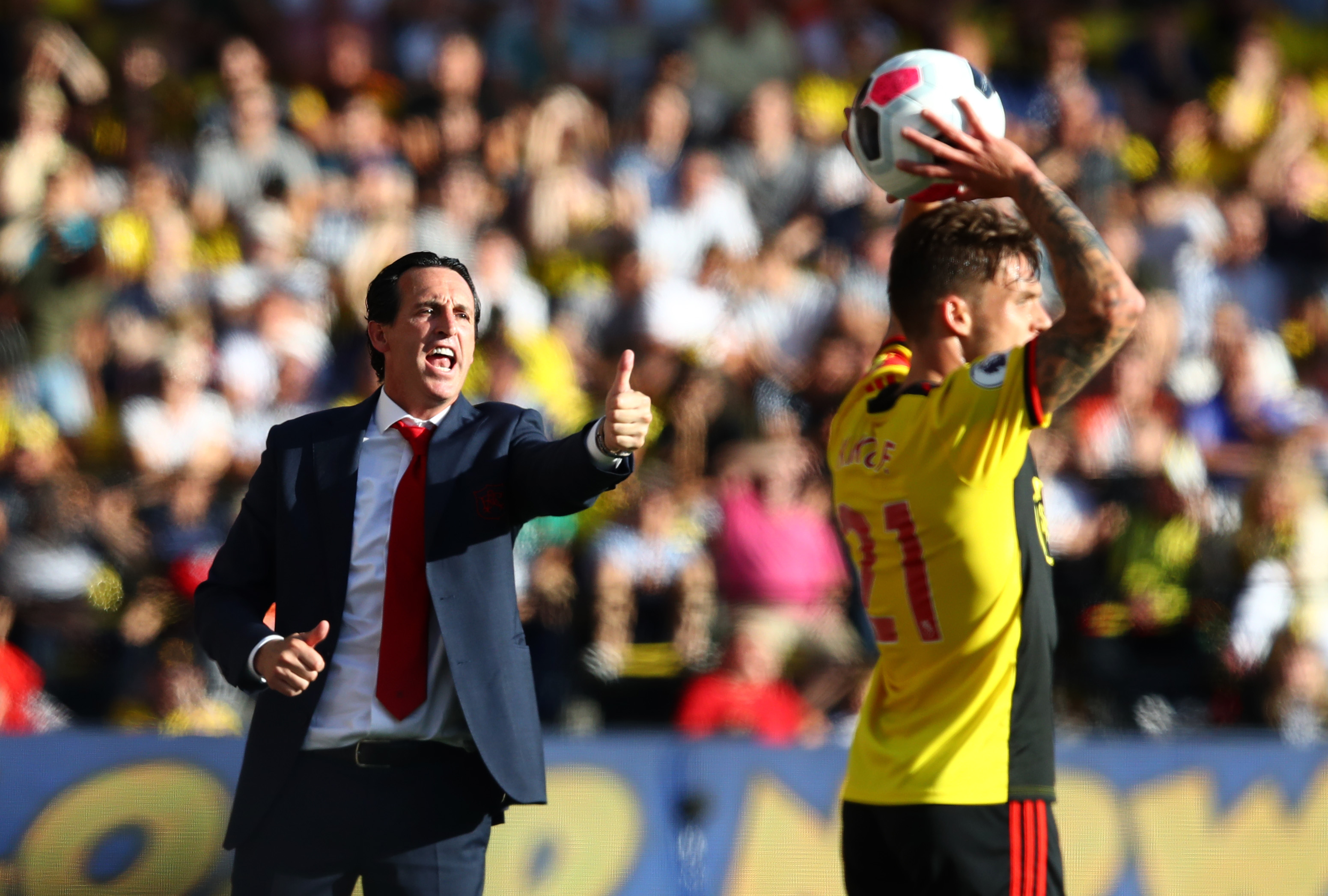 WATFORD, ENGLAND - SEPTEMBER 15:  Unai Emery, Manager of Arsenal reacts as Kiko Femenia of Watford take a throw in during the Premier League match between Watford FC and Arsenal FC at Vicarage Road on September 15, 2019 in Watford, United Kingdom. (Photo by Julian Finney/Getty Images)