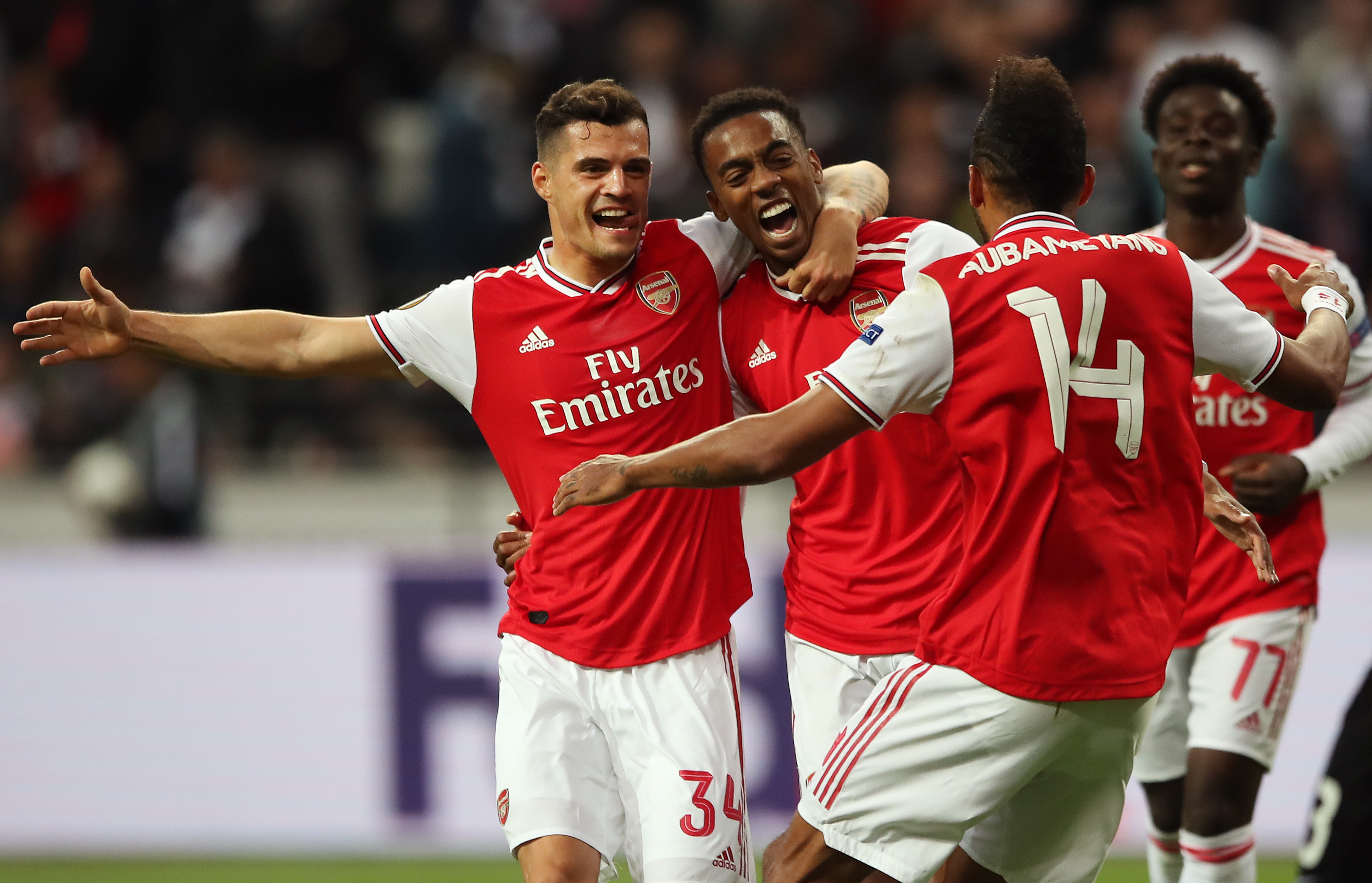 FRANKFURT AM MAIN, GERMANY - SEPTEMBER 19: Joe Willock of Arsenal celebrates with Granit Xhaka after he scores his teams first goal during the UEFA Europa League group F match between Eintracht Frankfurt and Arsenal FC at  on September 19, 2019 in Frankfurt am Main, Germany. (Photo by Christian Kaspar-Bartke/Bongarts/Getty Images)