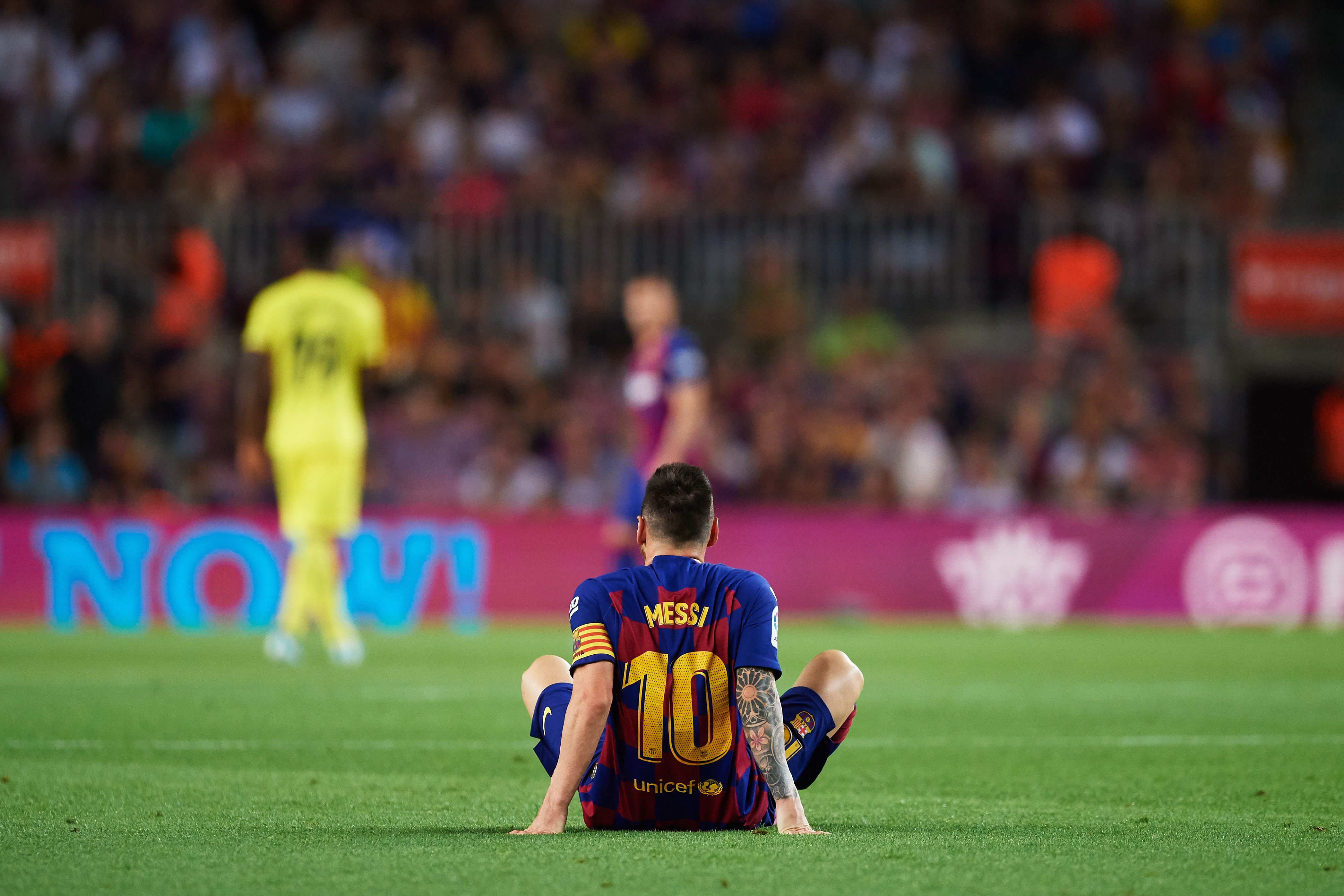 BARCELONA, SPAIN - SEPTEMBER 24: Lionel Messi of FC Barcelona lays on the pitch during the Liga match between FC Barcelona and Villarreal CF at Camp Nou on September 24, 2019 in Barcelona, Spain. (Photo by Alex Caparros/Getty Images)