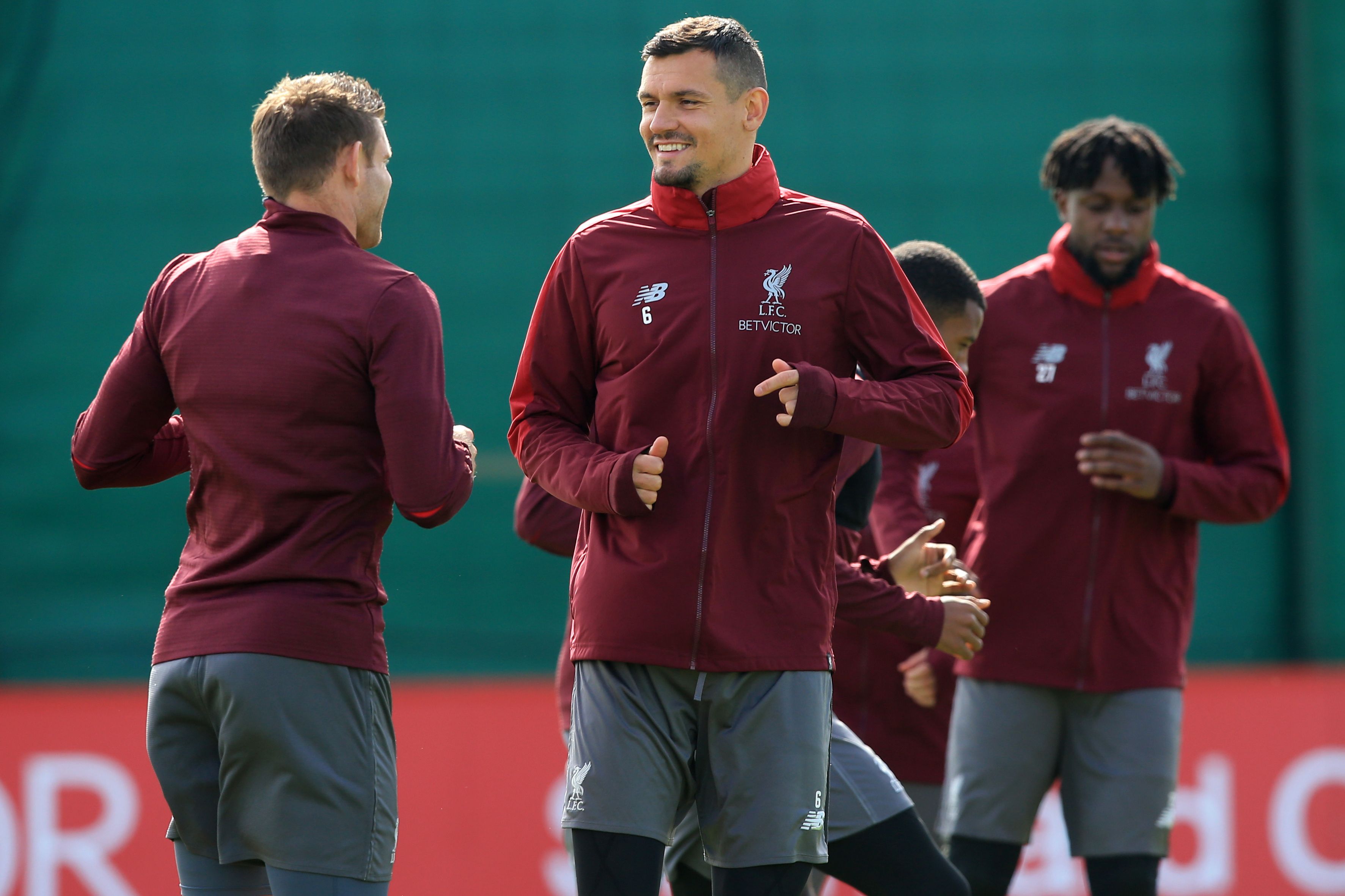 Liverpool's English midfielder James Milner (L), Liverpool's Croatian defender Dejan Lovren (C) and Liverpool's Belgian striker Divock Origi takes part in a team training session at Melwood in Liverpool, north west England on May 6, 2019, on the eve of their UEFA Champions League semi-final second leg football match against Barcelona. (Photo by Lindsey PARNABY / AFP)        (Photo credit should read LINDSEY PARNABY/AFP/Getty Images)