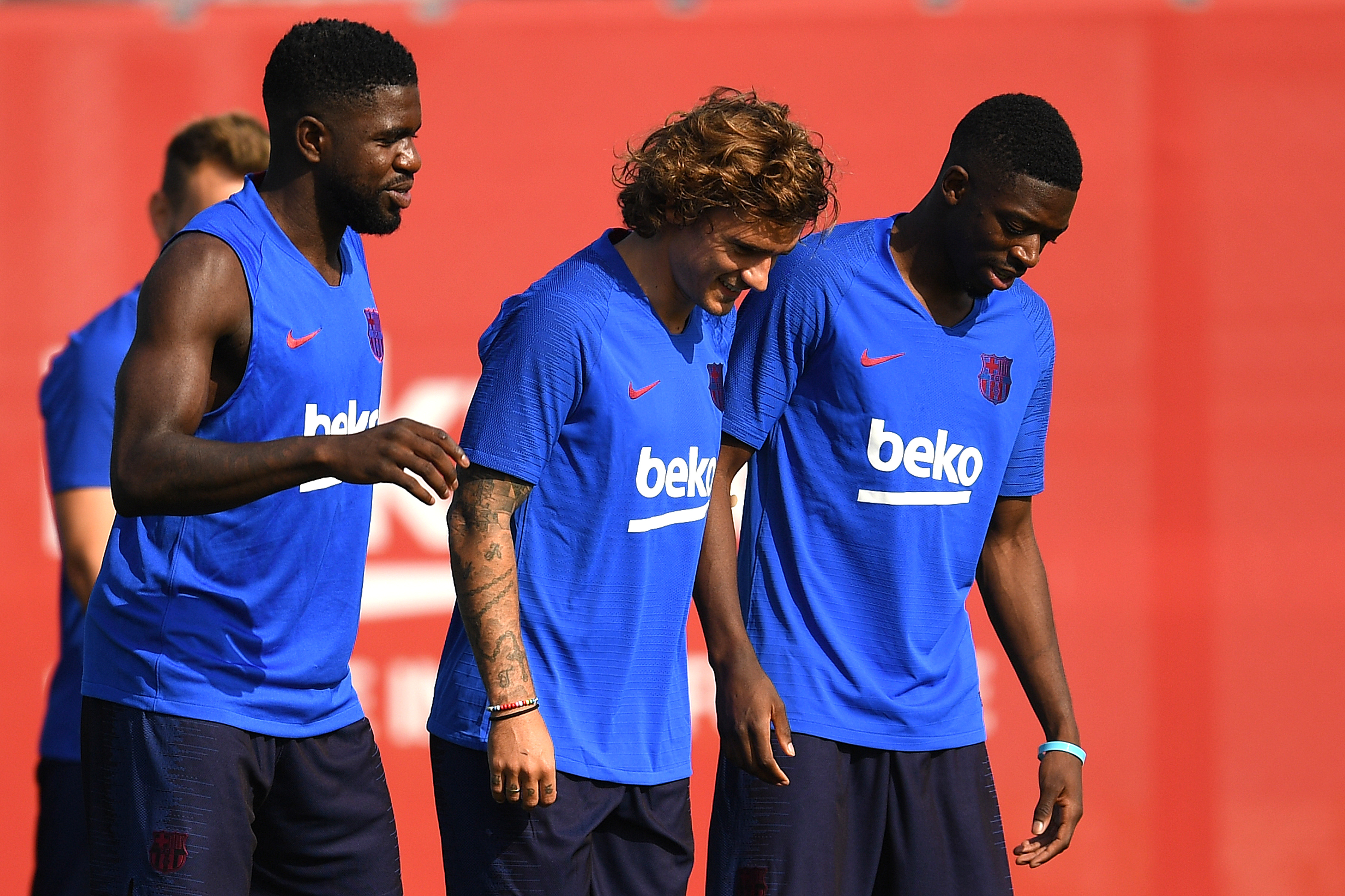 BARCELONA, SPAIN - JULY 15: Samuel Umtiti, Antoine Griezmann and Ousmane Dembele of FC Barcelona arrive at their first training session at Ciutat Esportiva of Sant Joan Despi on July 15, 2019 in Barcelona, Spain. (Photo by David Ramos/Getty Images)