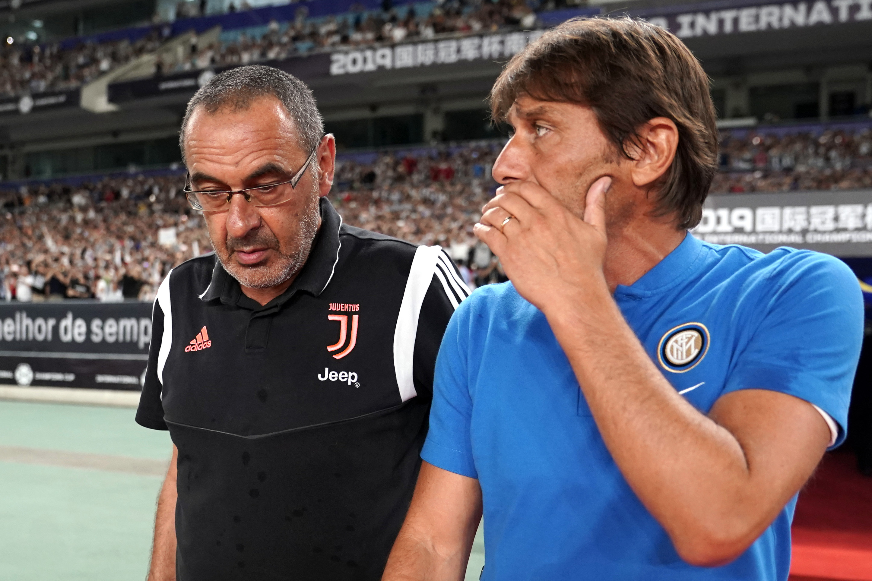 NANJING, CHINA - JULY 24: Head coach Maurizio Sarri of Juventus and Head coach Antonio Conte of FC Internazionale talk prior to the International Champions Cup match between Juventus and FC Internazionale at the Nanjing Olympic Center Stadium on July 24, 2019 in Nanjing, China. (Photo by Fred Lee/Getty Images)