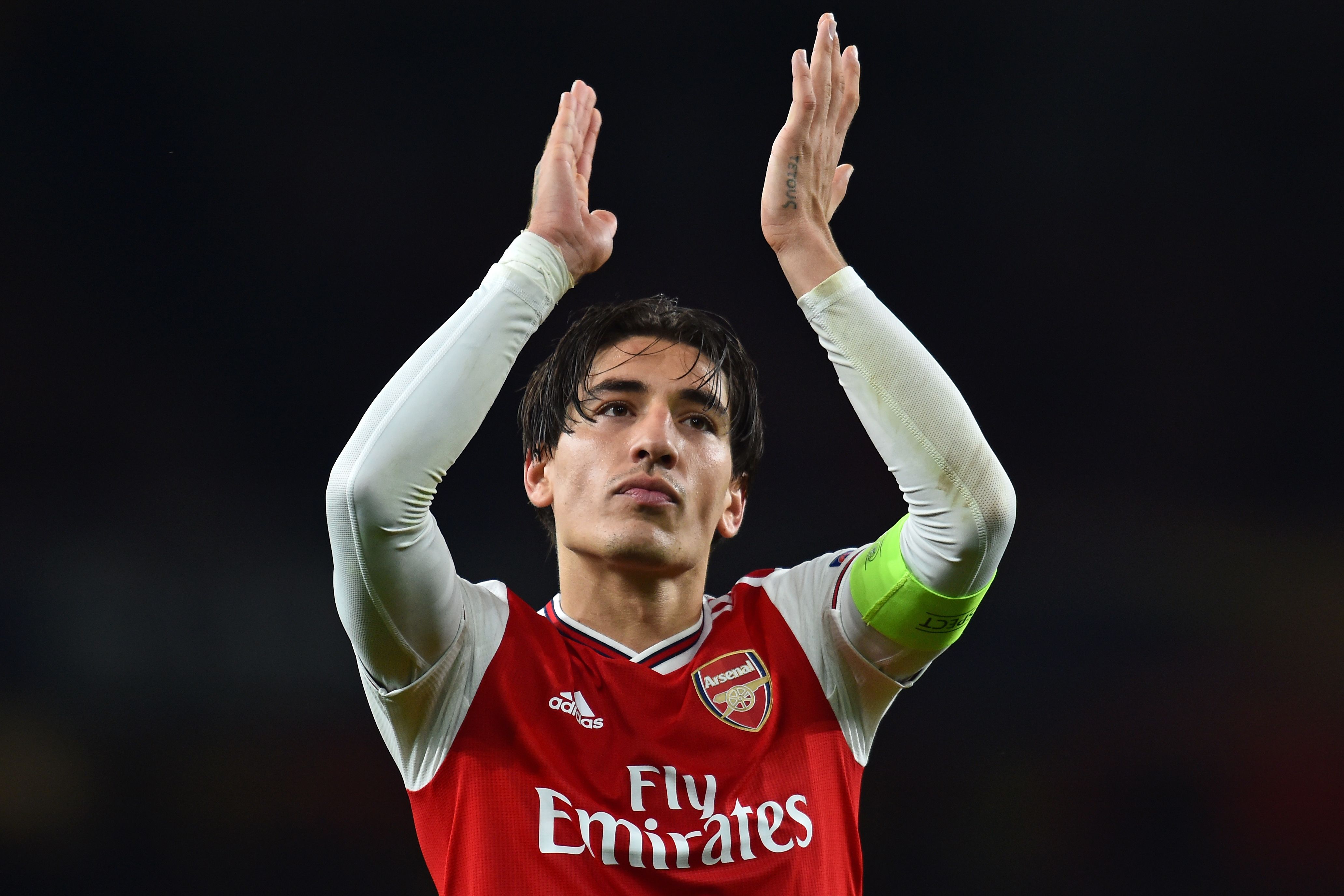 Arsenal's Spanish defender Hector Bellerin applauds as he celebrates on the pitch after the UEFA Europa League Group F football match between Arsenal and Standard Liege at the Arsenal Stadium in London on October 3, 2019. - Arsenal won the game 4-0. (Photo by Glyn KIRK / AFP) (Photo by GLYN KIRK/AFP via Getty Images)