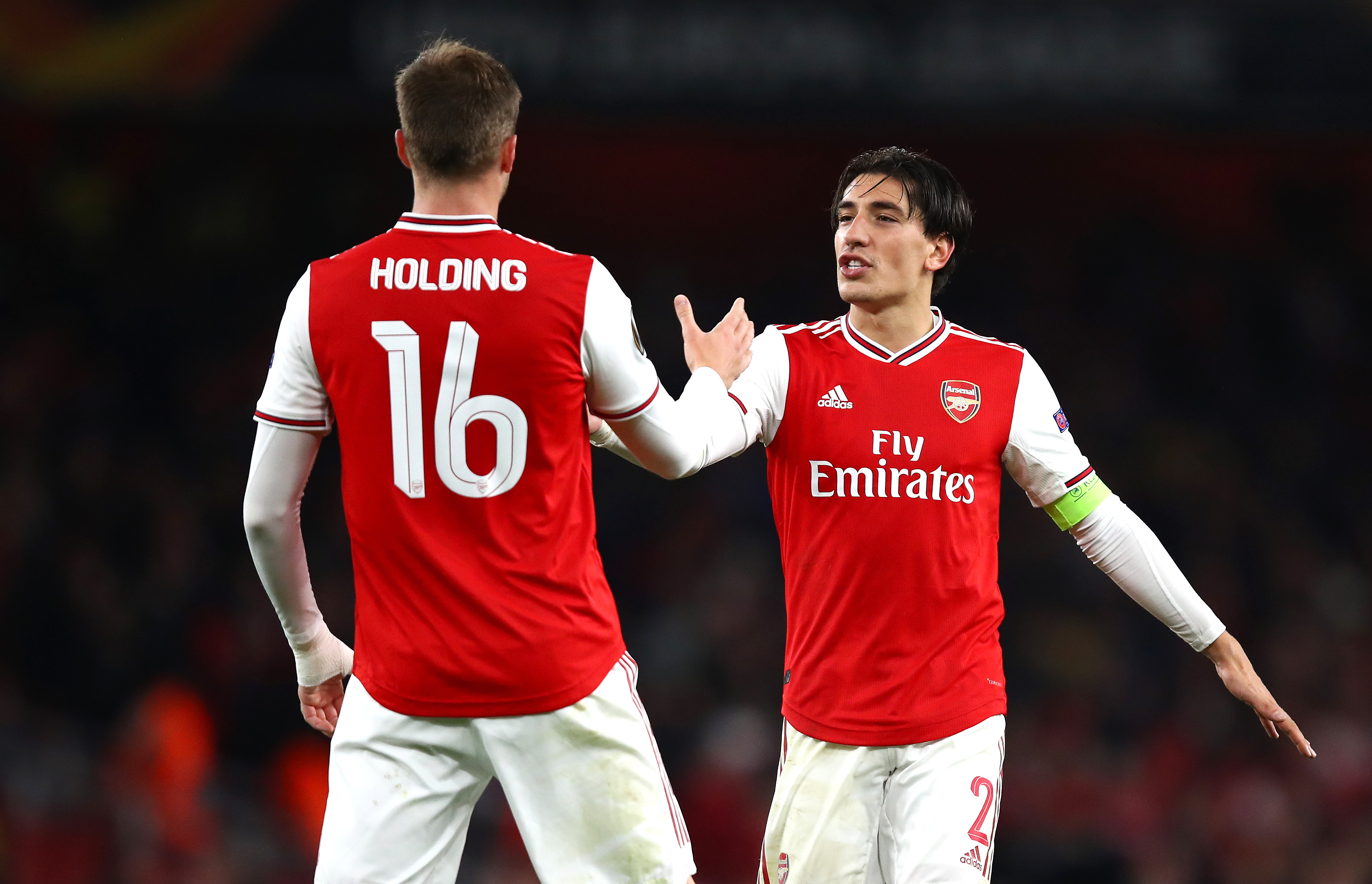 LONDON, ENGLAND - OCTOBER 03: Hector Bellerin of Arsenal celebrates victory with Rob Holding of Arsenal following the UEFA Europa League group F match between Arsenal FC and Standard Liege at Emirates Stadium on October 03, 2019 in London, United Kingdom. (Photo by Julian Finney/Getty Images)