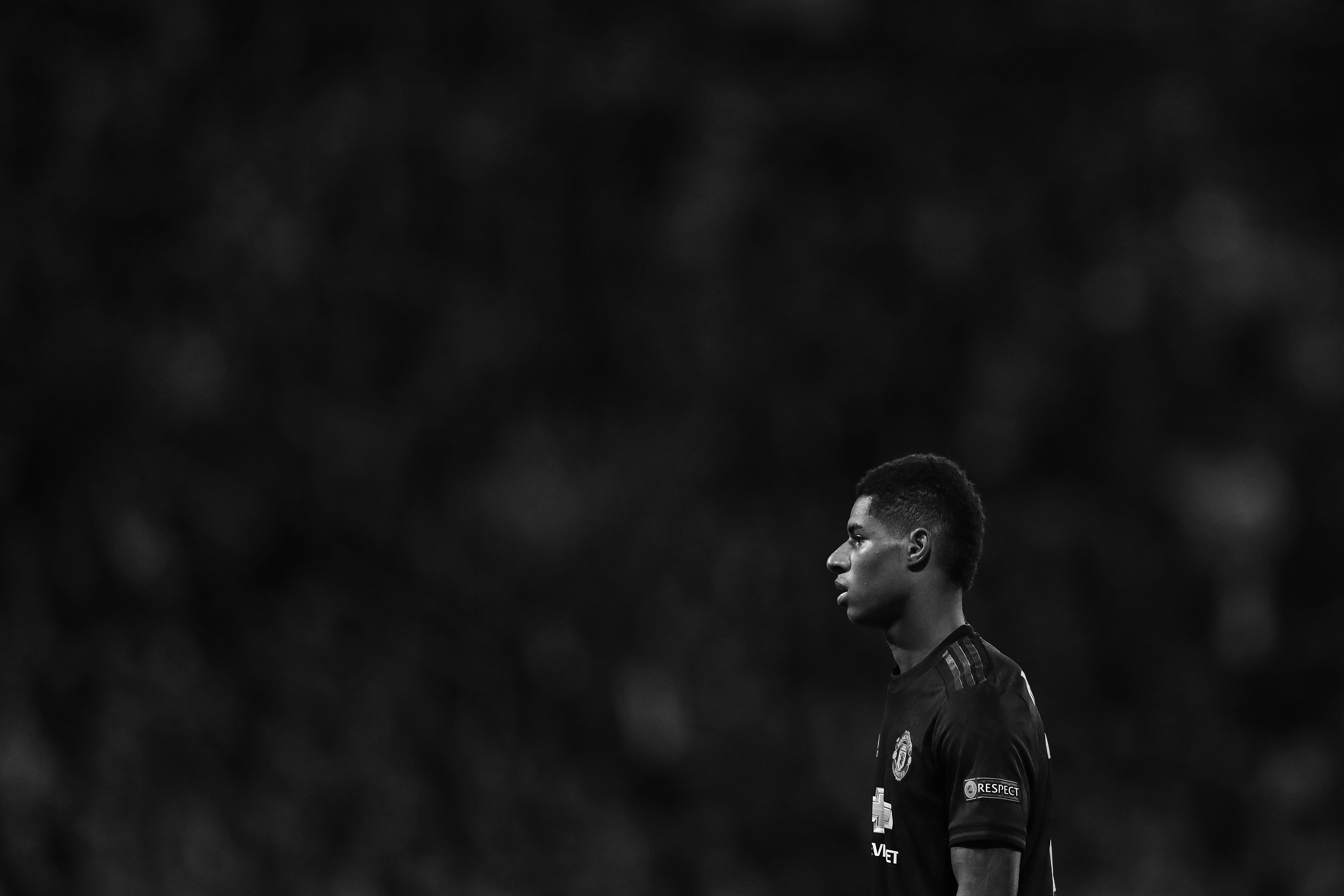 ALKMAAR, NETHERLANDS - OCTOBER 03: (EDITORS NOTE - This image has been converted to black and white(EDITORS NOTE: Image has been converted to black and white.) Marcus Rashford of Manchester United looks on during the UEFA Europa League group L match between AZ Alkmaar and Manchester United at AFAS-Stadium on October 03, 2019 in Alkmaar, Netherlands. (Photo by Naomi Baker/Getty Images)