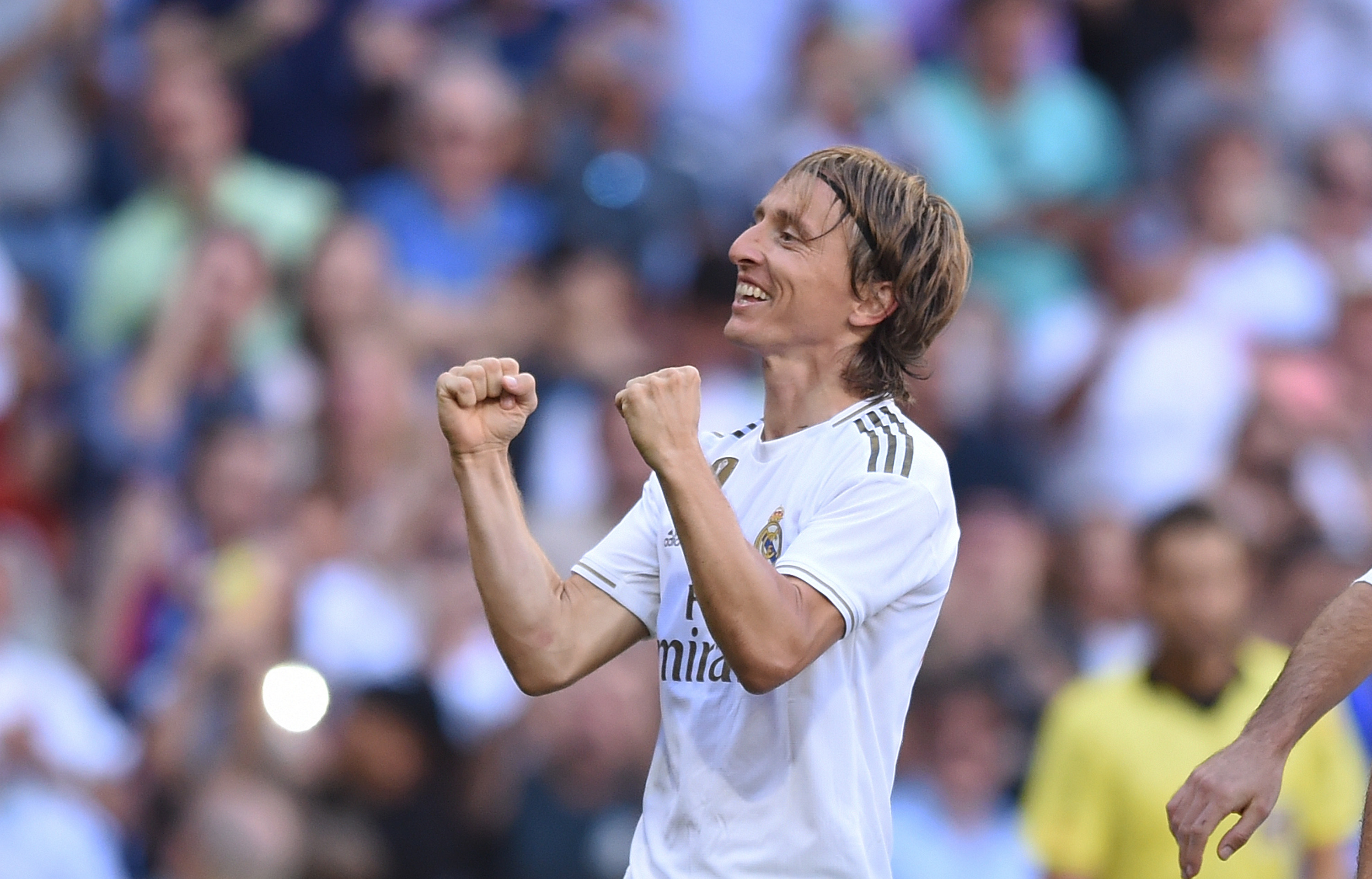 MADRID, SPAIN - OCTOBER 05: Luka Modric of Real Madrid celebrates after scoring Real's 3rd goal during the Liga match between Real Madrid CF and Granada CF at Estadio Santiago Bernabeu on October 05, 2019 in Madrid, Spain. (Photo by Denis Doyle/Getty Images)