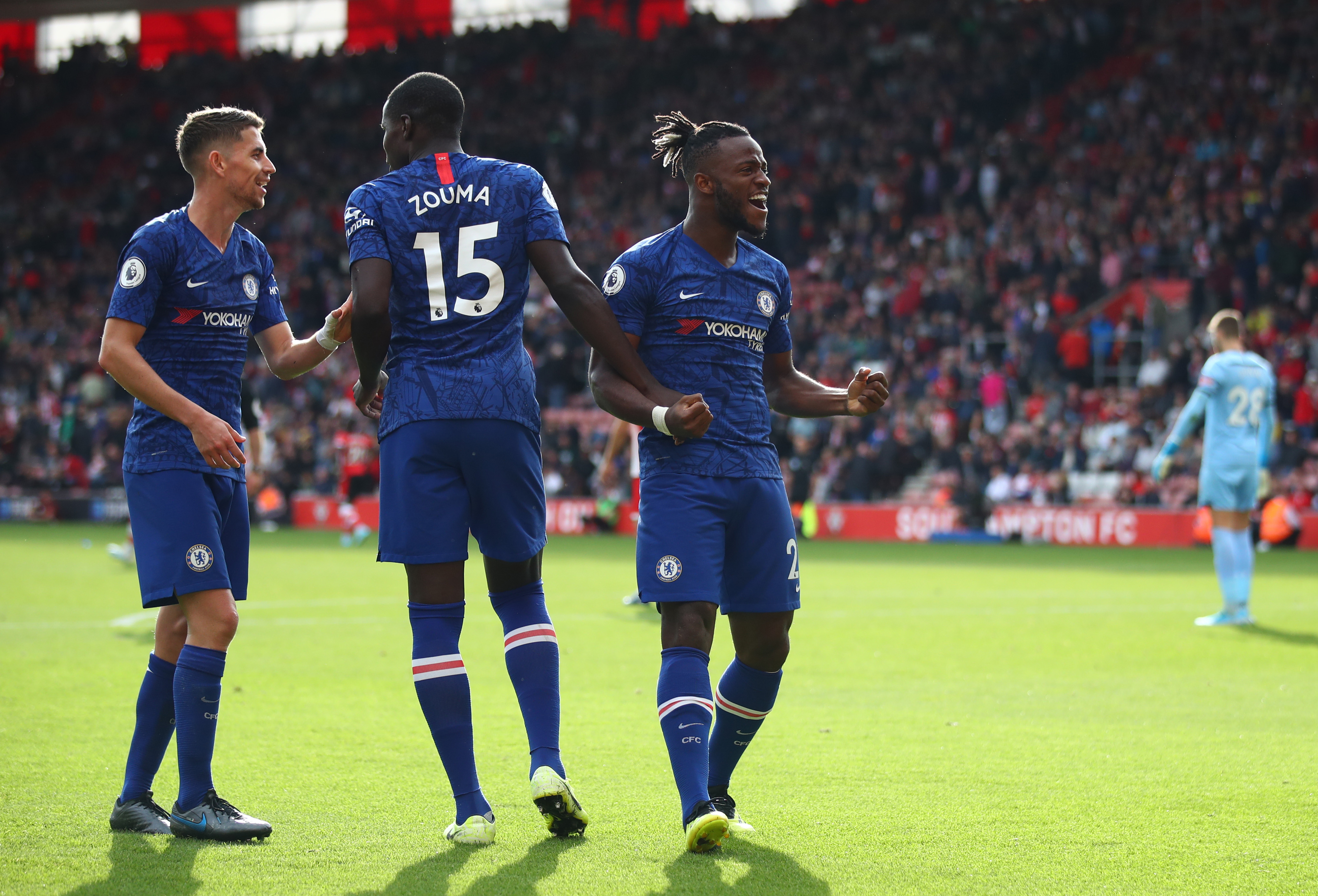 SOUTHAMPTON, ENGLAND - OCTOBER 06: Michy Batshuayi of Chelsea celebrates with teammates Kurt Zouma and Jorginho of Chelsea after scoring his teams fourth goal the Premier League match between Southampton FC and Chelsea FC at St Mary's Stadium on October 06, 2019 in Southampton, United Kingdom. (Photo by Julian Finney/Getty Images)