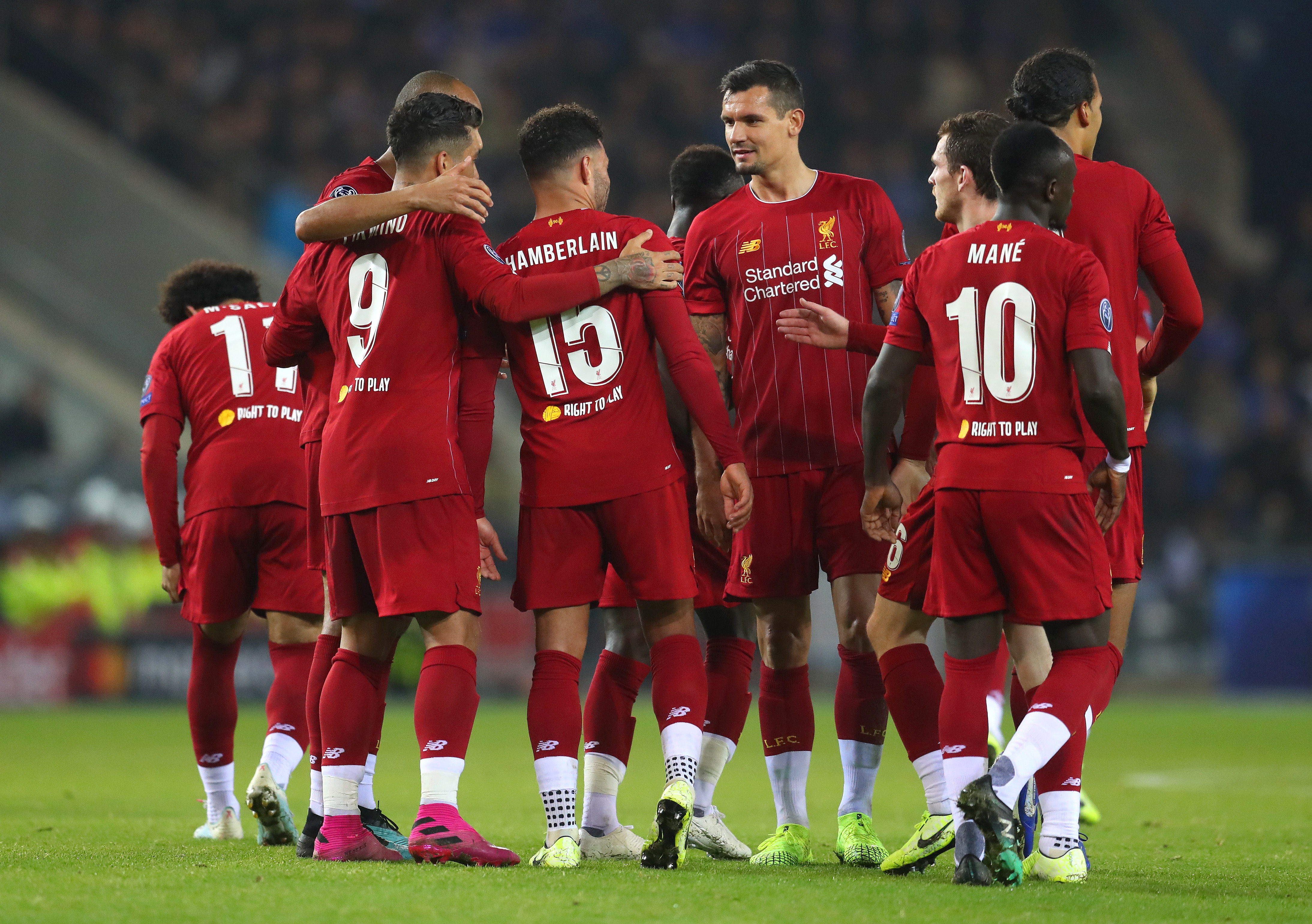 GENK, BELGIUM - OCTOBER 23: Alex Oxlade-Chamberlain of Liverpool celebrates with teammates after scoring his team's second goal during the UEFA Champions League group E match between KRC Genk and Liverpool FC at Luminus Arena on October 23, 2019 in Genk, Belgium. (Photo by Catherine Ivill/Getty Images)
