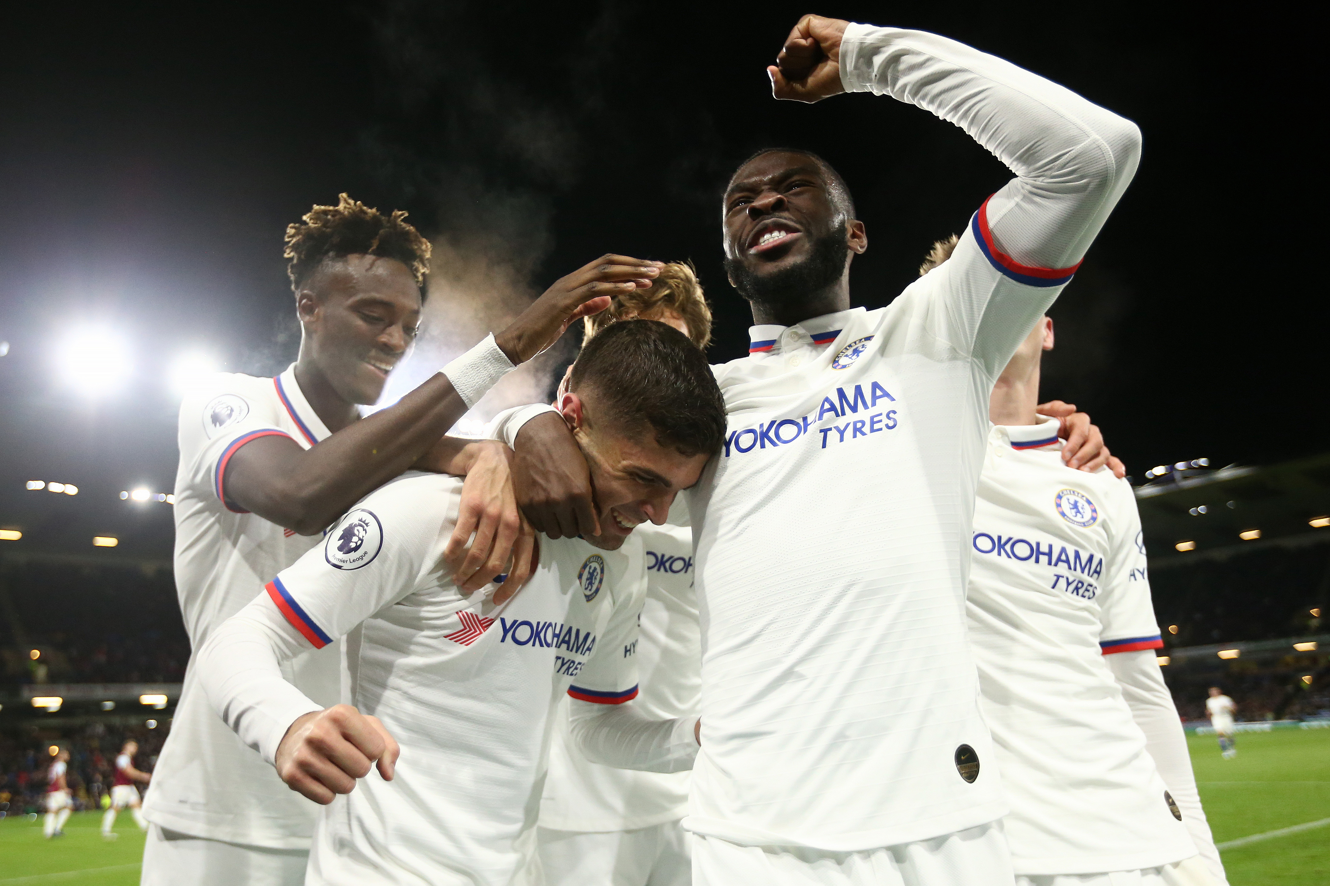 BURNLEY, ENGLAND - OCTOBER 26: Christian Pulisic of Chelsea celebrates with teammate Fikayo Tomori after scoring his sides third goal during the Premier League match between Burnley FC and Chelsea FC at Turf Moor on October 26, 2019 in Burnley, United Kingdom. (Photo by Jan Kruger/Getty Images)