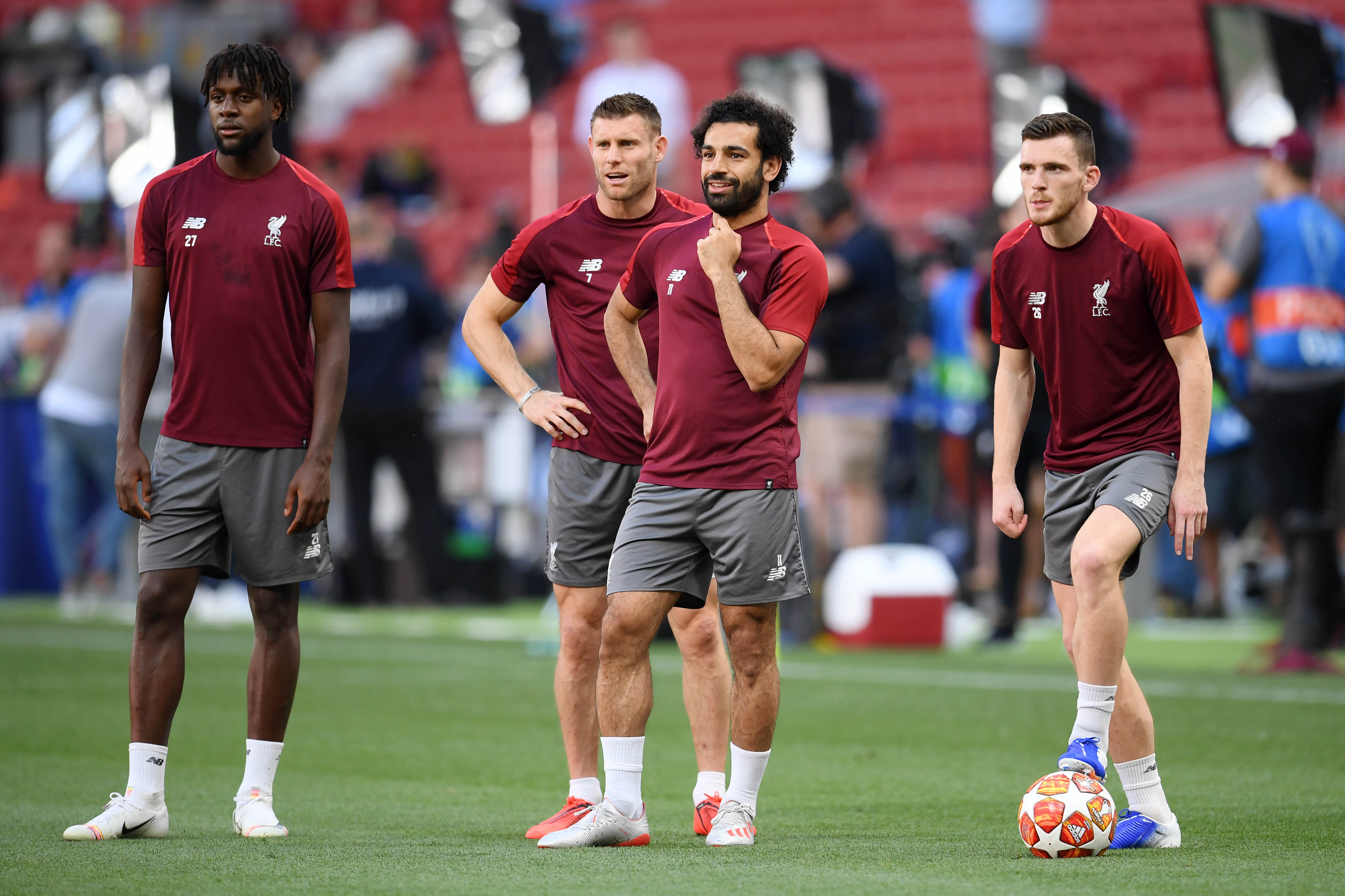 MADRID, SPAIN - MAY 31: Divock Origi, James Milner, Mohamed Salah and Andy Robertson of Liverpool look on during the Liverpool FC training session on the eve of the UEFA Champions League Final against Tottenham Hotspur at Estadio Wanda Metropolitano on May 31, 2019 in Madrid, Spain. (Photo by Matthias Hangst/Getty Images)