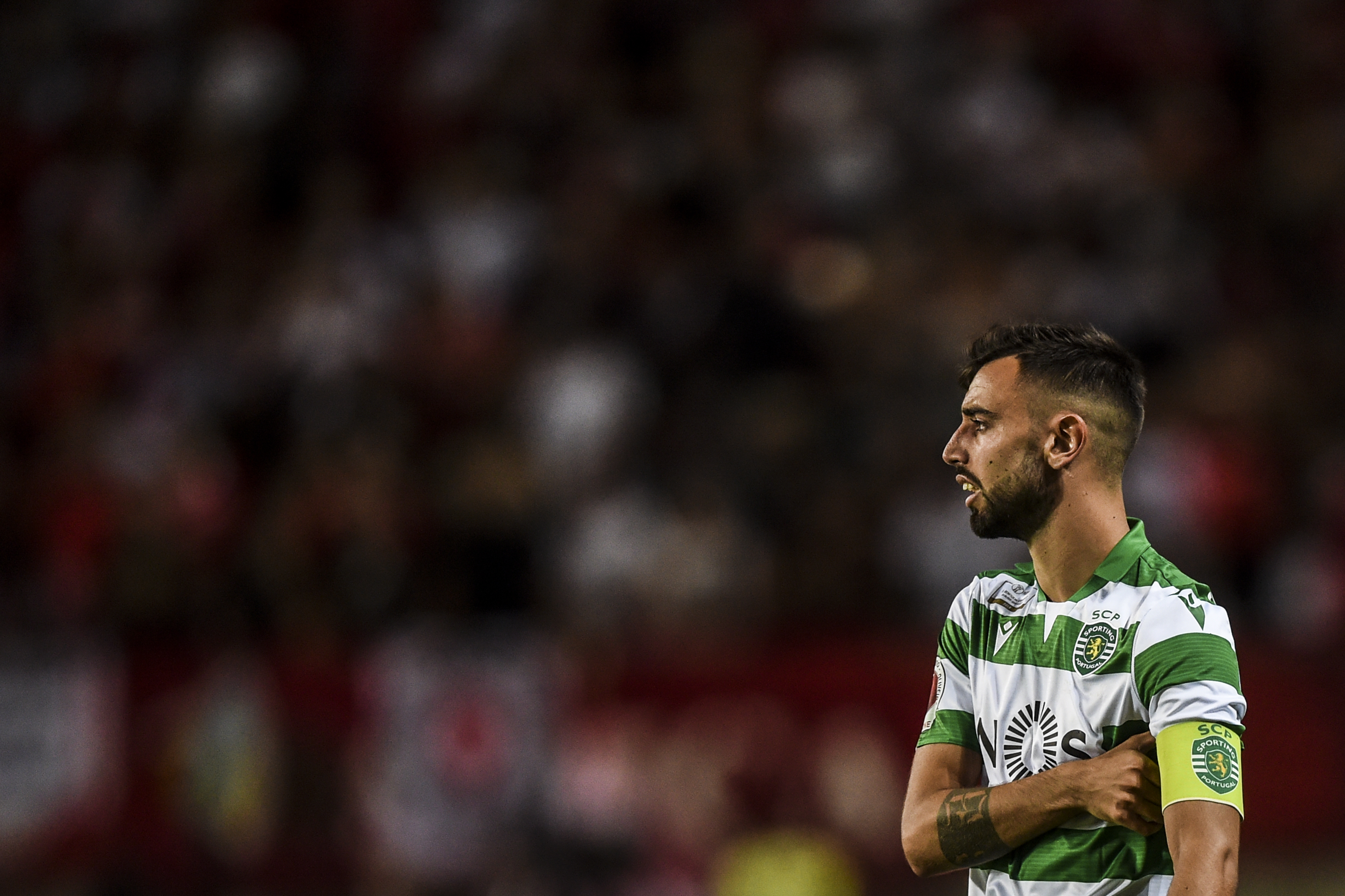 Sporting's Portuguese midfielder Bruno Fernandes looks on during the Portugal's Candido de Oliveira Super Cup final football match between SL Benfica and Sporting CP at the Algarve stadium in Faro on August 4, 2019. (Photo by PATRICIA DE MELO MOREIRA / AFP)        (Photo credit should read PATRICIA DE MELO MOREIRA/AFP via Getty Images)