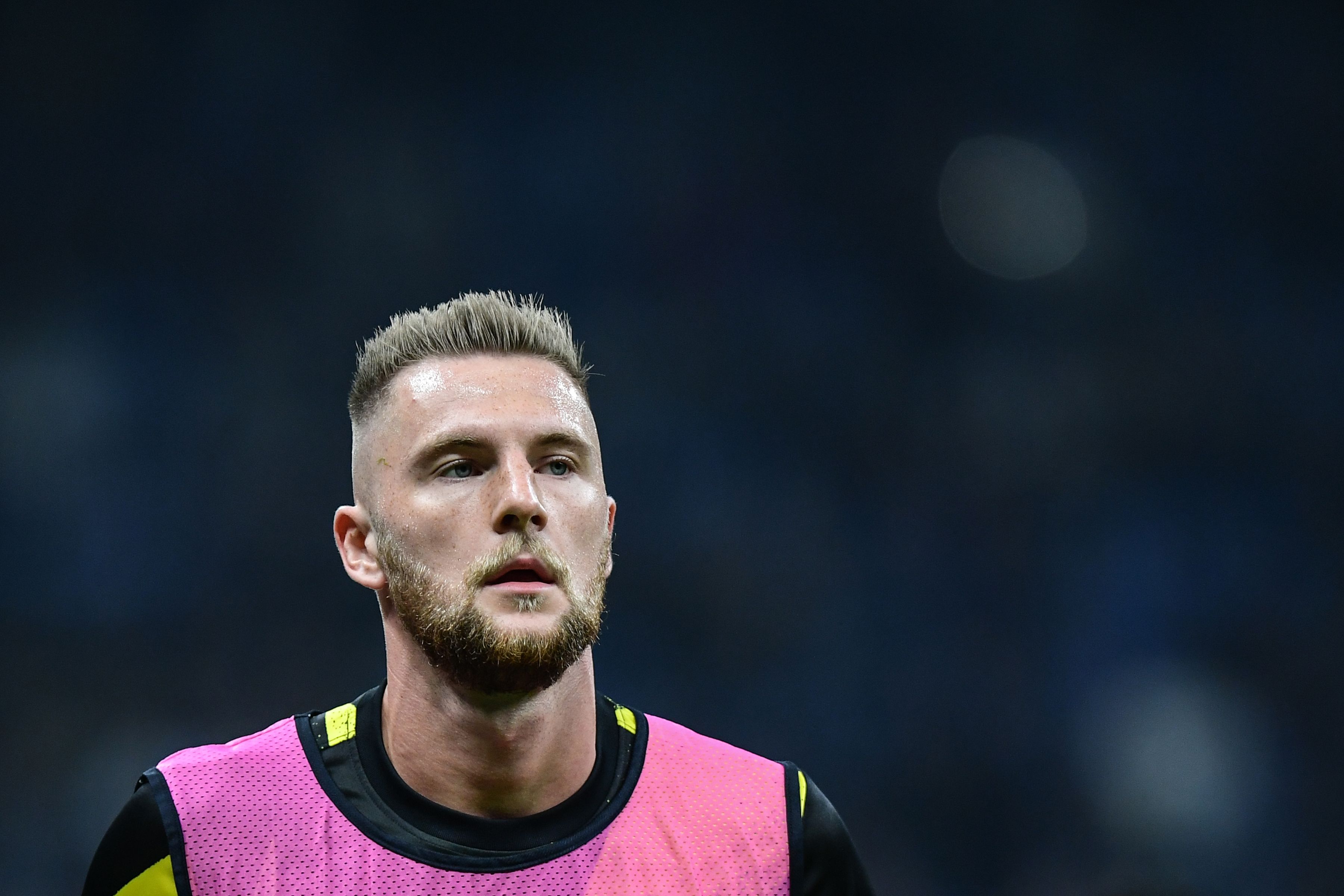Inter Milan's Slovakian defender Milan Skriniar warms up prior to the UEFA Champions League Group F football match Inter Milan vs Borussia Dortmund on October 23, 2019 at the San Siro stadium in Milan. (Photo by Miguel MEDINA / AFP) (Photo by MIGUEL MEDINA/AFP via Getty Images)