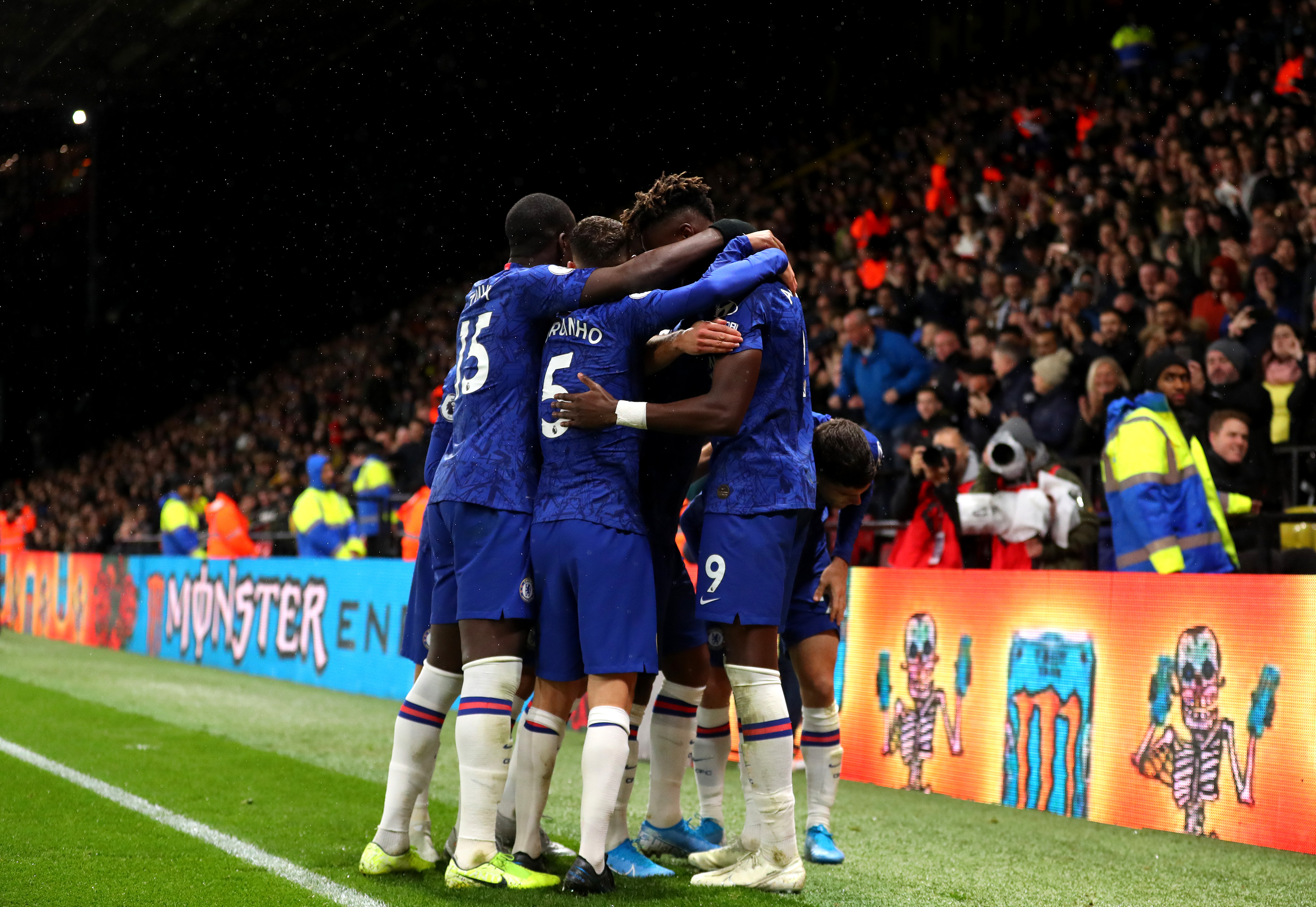 WATFORD, ENGLAND - NOVEMBER 02: Christian Pulisic of Chelsea (obscured) celebrates with Jorginho, Tammy Abraham and teammates after scoring his team's second goal during the Premier League match between Watford FC and Chelsea FC at Vicarage Road on November 02, 2019 in Watford, United Kingdom. (Photo by Catherine Ivill/Getty Images)