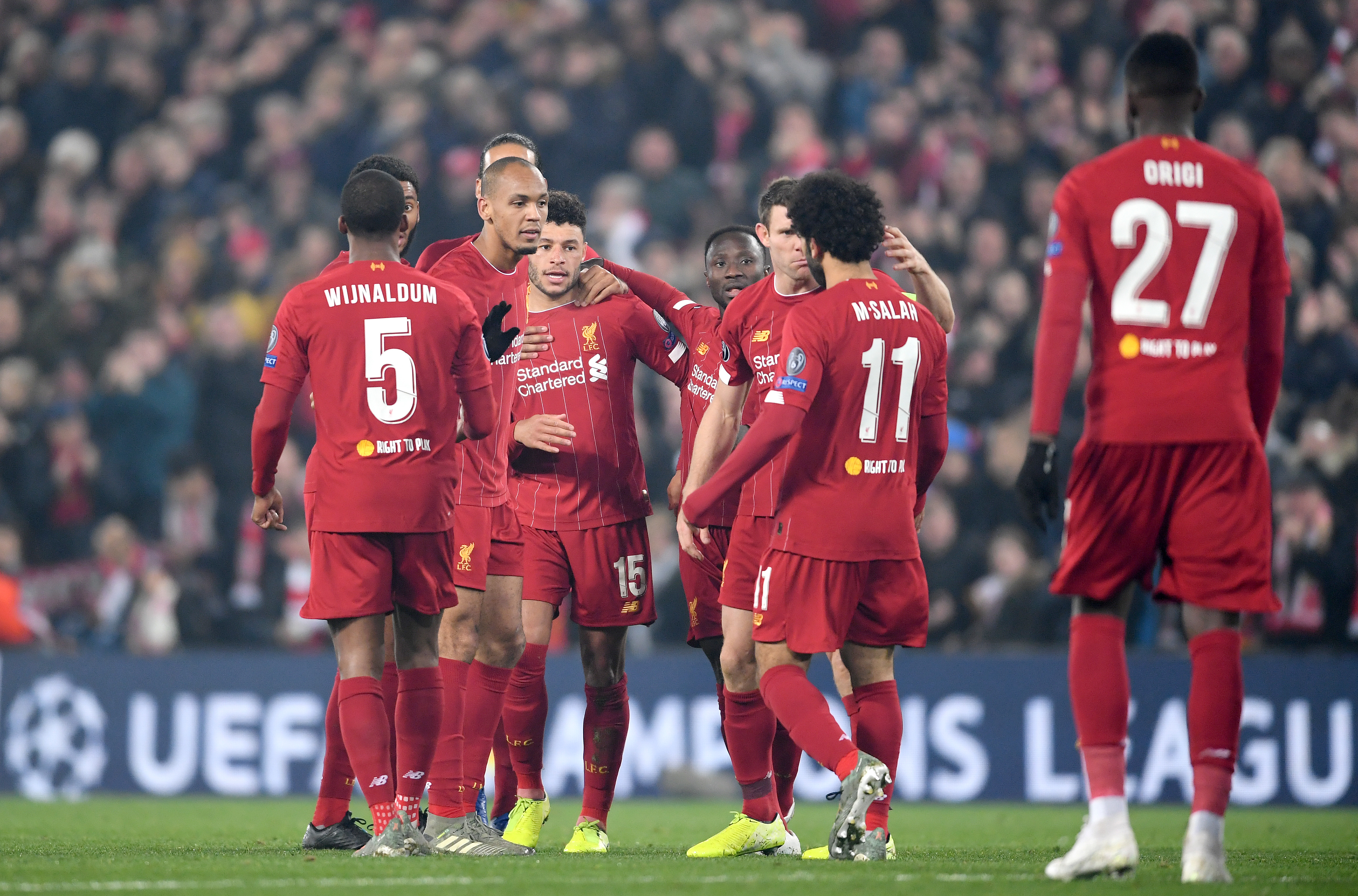 LIVERPOOL, ENGLAND - NOVEMBER 05: Alex Oxlade-Chamberlain of Liverpool celebrates with teammates after scoring his team's second goal during the UEFA Champions League group E match between Liverpool FC and KRC Genk at Anfield on November 05, 2019 in Liverpool, United Kingdom. (Photo by Laurence Griffiths/Getty Images)