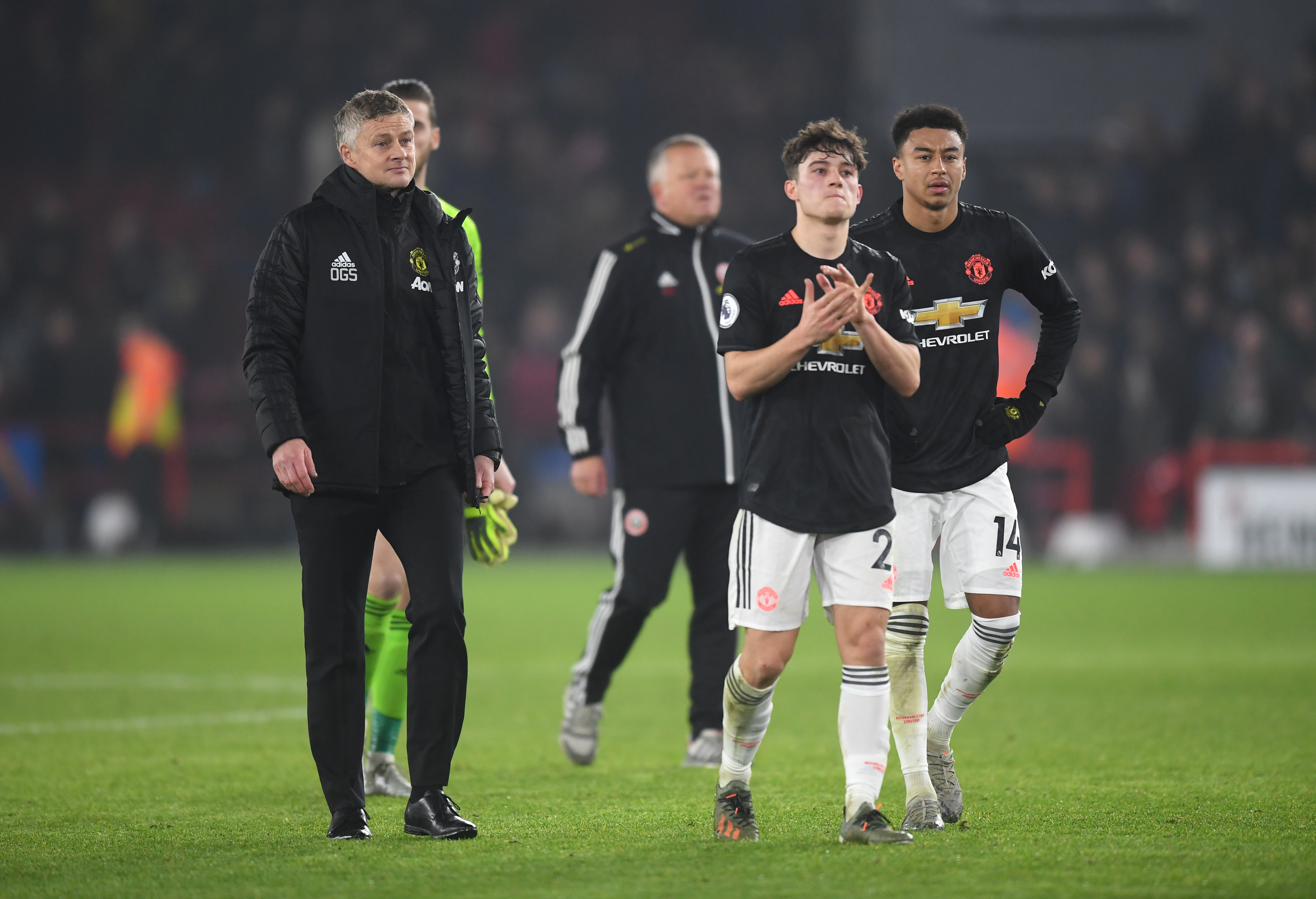 SHEFFIELD, ENGLAND - NOVEMBER 24: Ole Gunnar Solskjaer, Manager of Manchester United, Jesse Lingard and Daniel James of Manchester United acknowledge the fans following the Premier League match between Sheffield United and Manchester United at Bramall Lane on November 24, 2019 in Sheffield, United Kingdom. (Photo by Michael Regan/Getty Images)