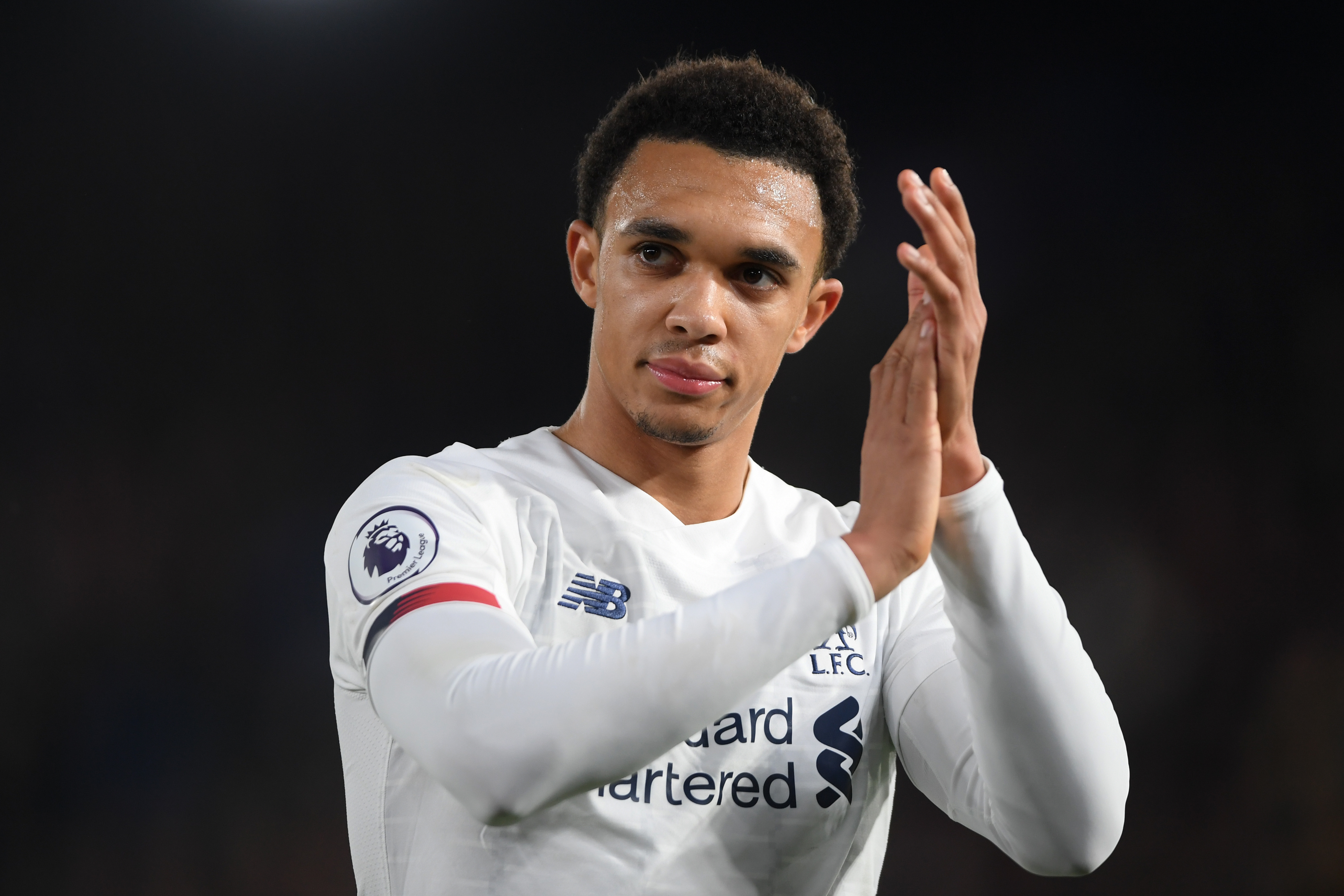 LONDON, ENGLAND - NOVEMBER 23: Trent Alexander-Arnold of Liverpool applauds the travelling fans during the Premier League match between Crystal Palace and Liverpool FC at Selhurst Park on November 23, 2019 in London, United Kingdom. (Photo by Mike Hewitt/Getty Images)