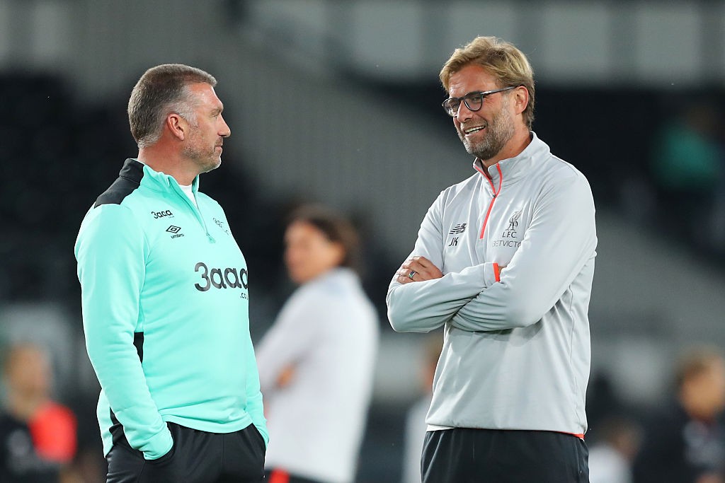 DERBY, ENGLAND - SEPTEMBER 20: Nigel Pearson (L), Manager of Derby County talks to Jurgen Klopp, Manager of Liverpool prior to the EFL Cup Third Round match between Derby County and Liverpool at iPro Stadium on September 20, 2016 in Derby, England. (Photo by Richard Heathcote/Getty Images)
