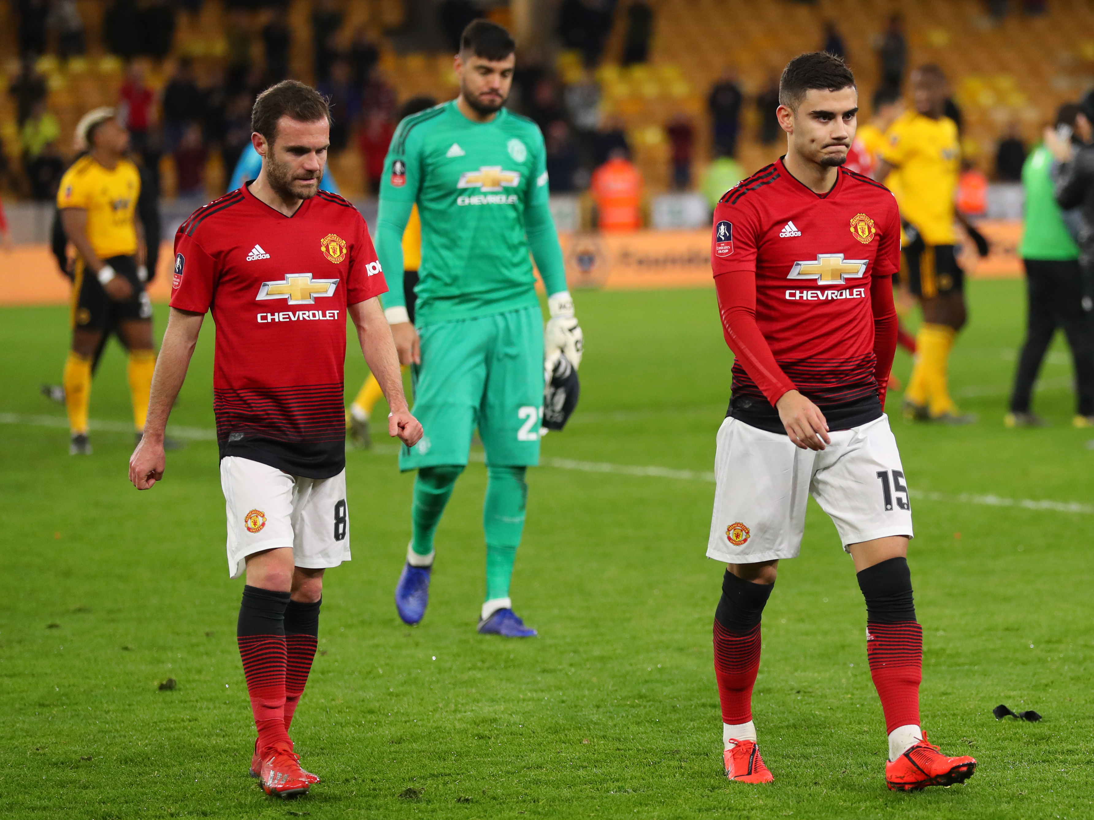 WOLVERHAMPTON, ENGLAND - MARCH 16: Juan Mata and Andreas Pereira of Manchester United leave the pitch following defeat in the FA Cup Quarter Final match between Wolverhampton Wanderers and Manchester United at Molineux on March 16, 2019 in Wolverhampton, England. (Photo by Catherine Ivill/Getty Images)
