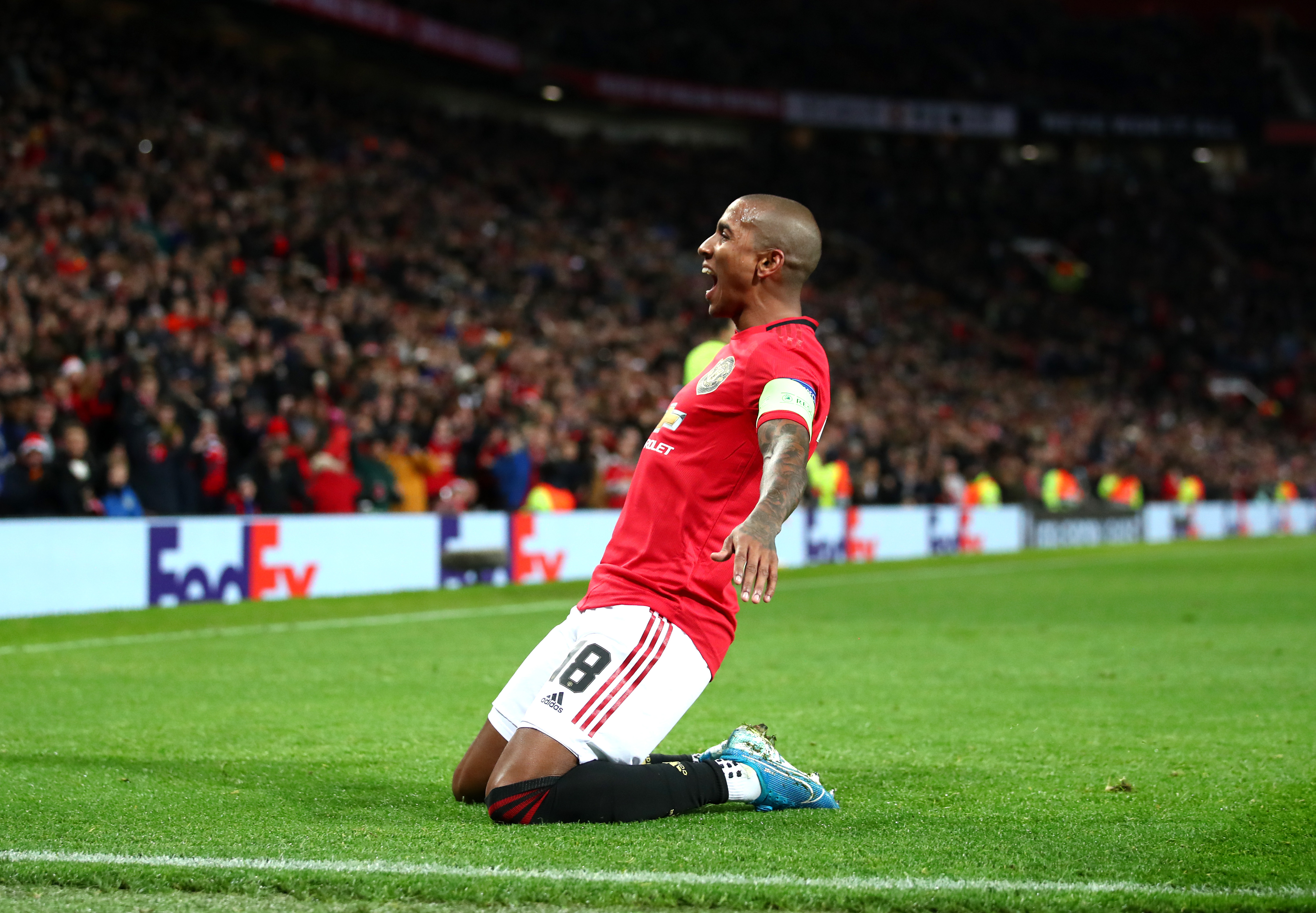 MANCHESTER, ENGLAND - DECEMBER 12: Ashley Young of Manchester United celebrates after scoring his team's first goal during the UEFA Europa League group L match between Manchester United and AZ Alkmaar at Old Trafford on December 12, 2019 in Manchester, United Kingdom. (Photo by Clive Brunskill/Getty Images)