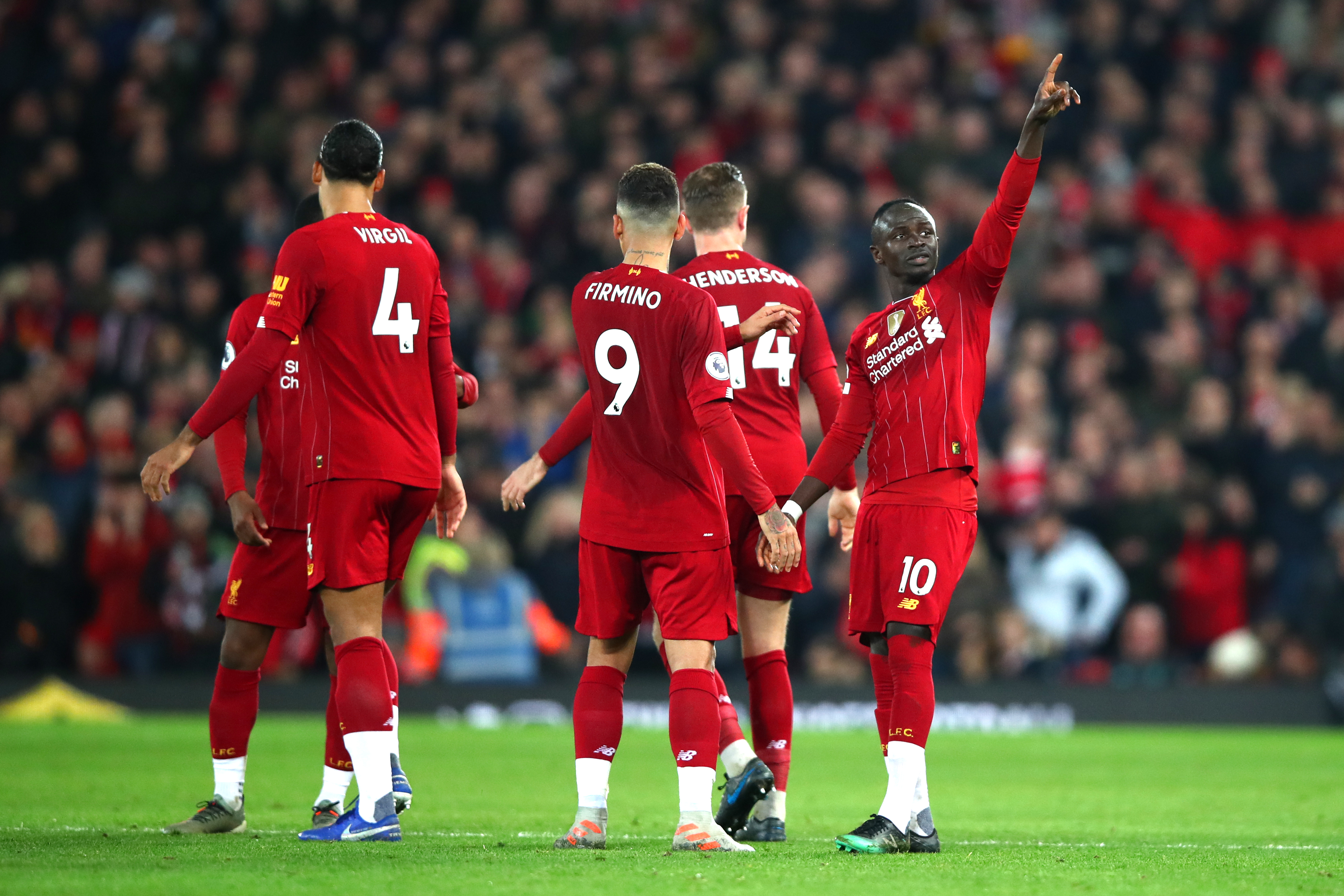 LIVERPOOL, ENGLAND - DECEMBER 29: Sadio Mane of Liverpool celebrates after scoring his sides first goal during the Premier League match between Liverpool FC and Wolverhampton Wanderers at Anfield on December 29, 2019 in Liverpool, United Kingdom. (Photo by Clive Brunskill/Getty Images)