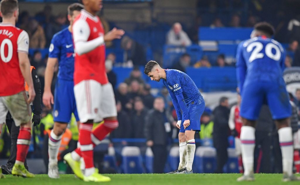 Chelsea's Italian midfielder Jorginho (C) reacts after the English Premier League football match between Chelsea and Arsenal at Stamford Bridge in London on January 21, 2020. - The match ended in a draw at 2-2. (Photo by Ben STANSALL / AFP) / RESTRICTED TO EDITORIAL USE. No use with unauthorized audio, video, data, fixture lists, club/league logos or 'live' services. Online in-match use limited to 120 images. An additional 40 images may be used in extra time. No video emulation. Social media in-match use limited to 120 images. An additional 40 images may be used in extra time. No use in betting publications, games or single club/league/player publications. / (Photo by BEN STANSALL/AFP via Getty Images)