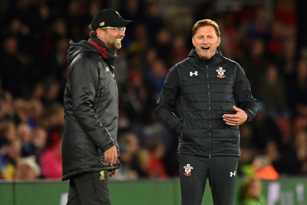 Liverpool's German manager Jurgen Klopp (L) and Southampton's Austrian manager Ralph Hasenhuttl (R) share a joke on the touchline during the English Premier League football match between Southampton and Liverpool at St Mary's Stadium in Southampton, southern England on April 5, 2019. (Photo by Glyn KIRK / AFP) / RESTRICTED TO EDITORIAL USE. No use with unauthorized audio, video, data, fixture lists, club/league logos or 'live' services. Online in-match use limited to 120 images. An additional 40 images may be used in extra time. No video emulation. Social media in-match use limited to 120 images. An additional 40 images may be used in extra time. No use in betting publications, games or single club/league/player publications. / (Photo credit should read GLYN KIRK/AFP via Getty Images)
