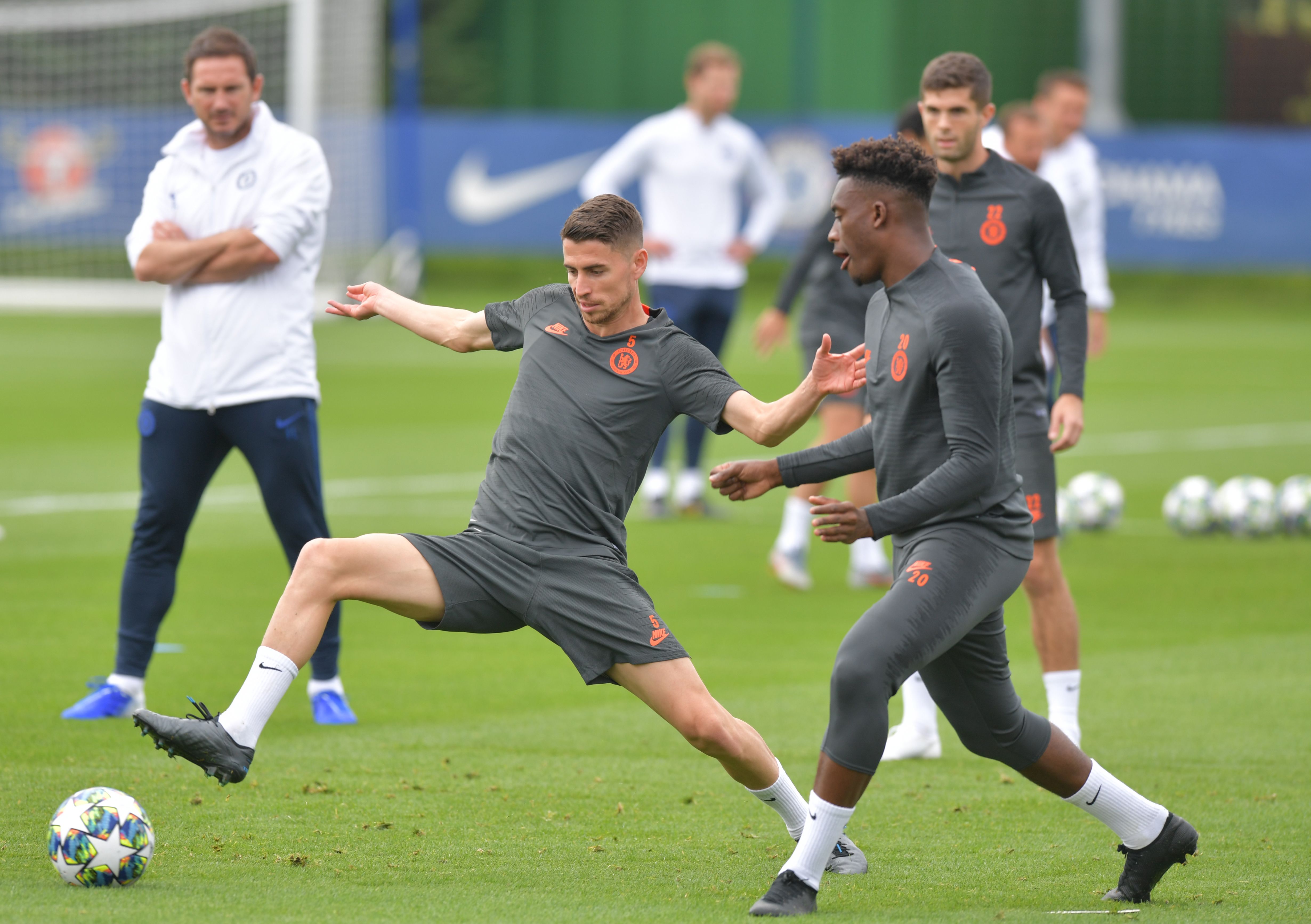 Chelsea's Italian midfielder Jorginho (L) and Chelsea's English midfielder Callum Hudson-Odoi take part in a training sesssion at their Cobham complex in south west London on the eve of their Champions league group stage football match against Valencia on September 16, 2019. (Photo by OLLY GREENWOOD / AFP)        (Photo credit should read OLLY GREENWOOD/AFP via Getty Images)