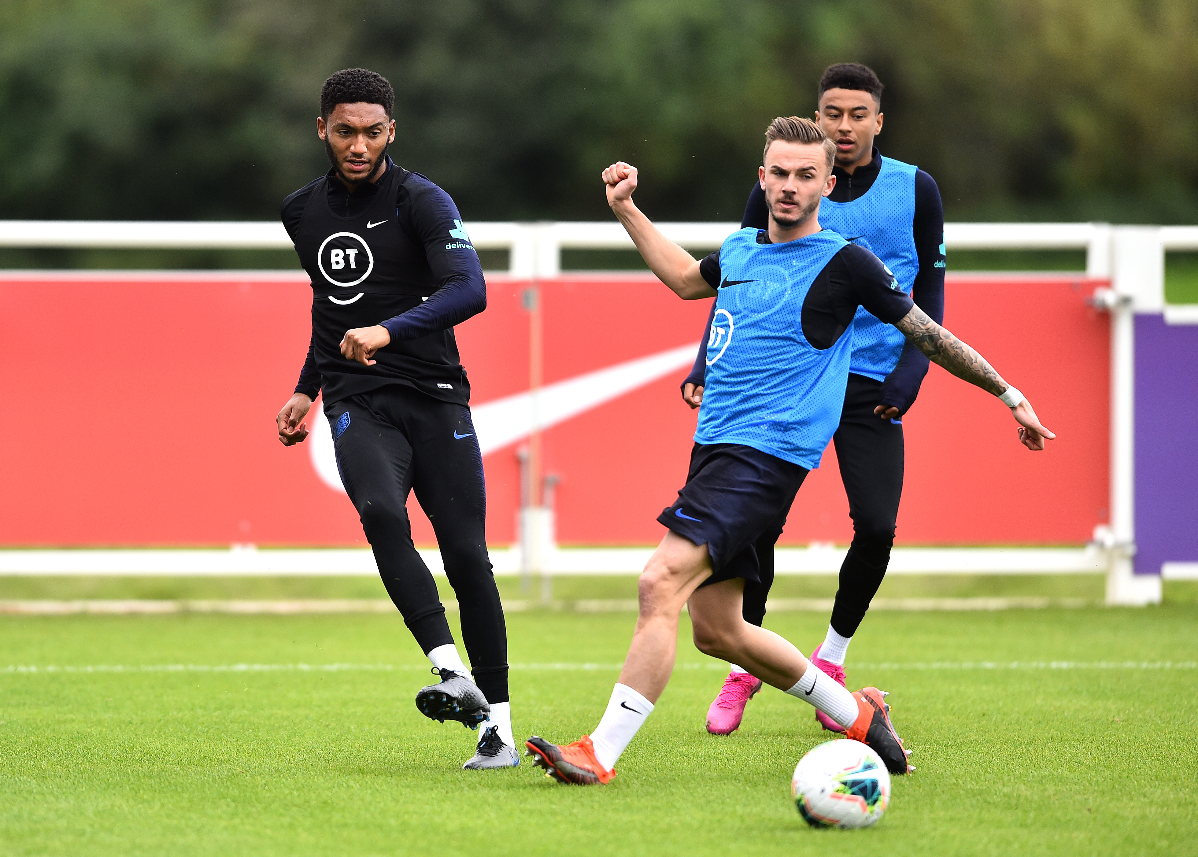 BURTON-UPON-TRENT, ENGLAND - SEPTEMBER 02: Joe Gomez, James Maddison and Jesse Lingard train during an England Media Access day at St Georges Park on September 02, 2019 in Burton-upon-Trent, England. (Photo by Nathan Stirk/Getty Images)