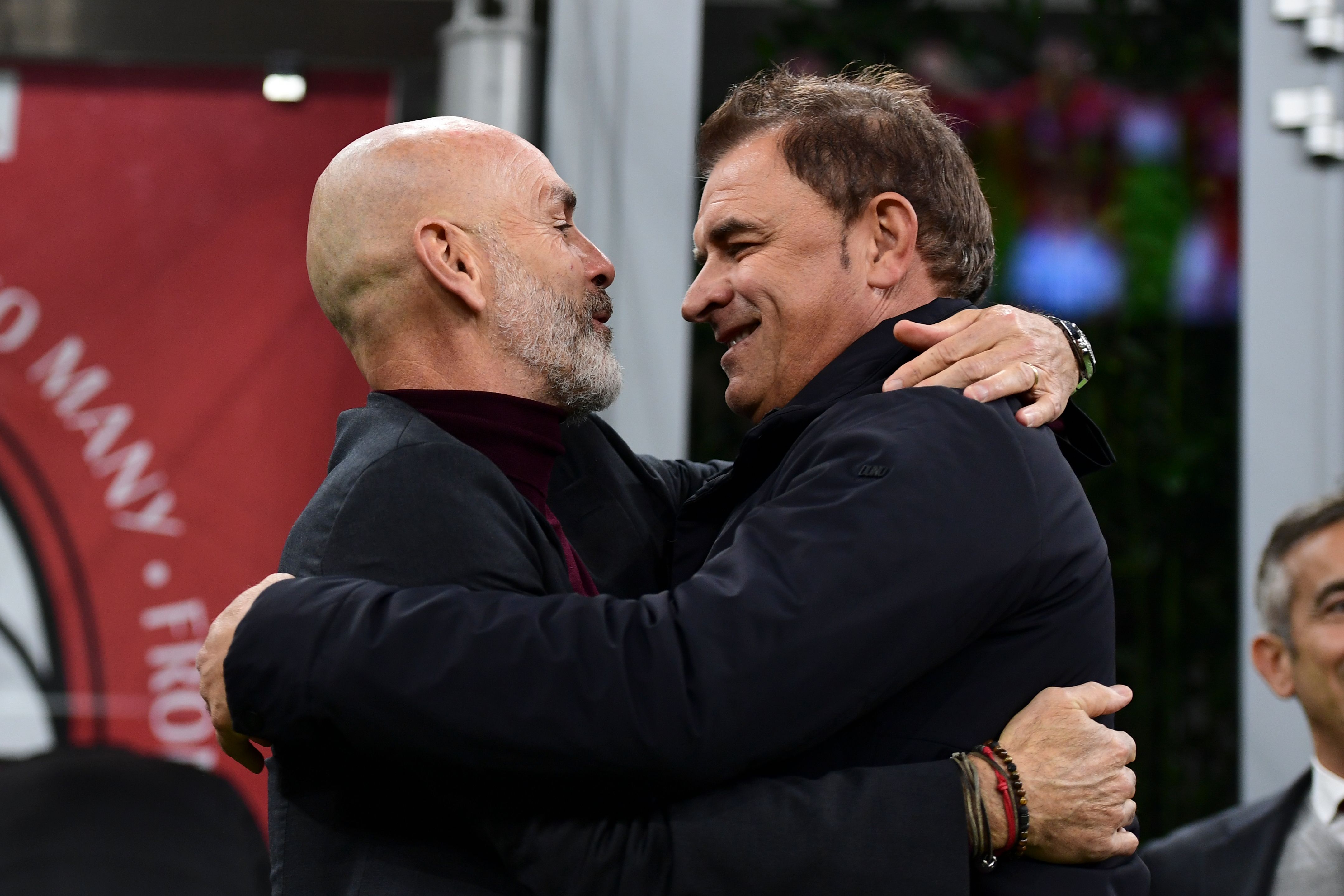AC Milan's Italian head coach Stefano Pioli (L) salutes Spal's Italian head coach Leonardo Semplici prior to the Italian Serie A football match AC Milan vs Spal on October 31, 2019 at the San Siro stadium in Milan. (Photo by MIGUEL MEDINA / AFP) (Photo by MIGUEL MEDINA/AFP via Getty Images)