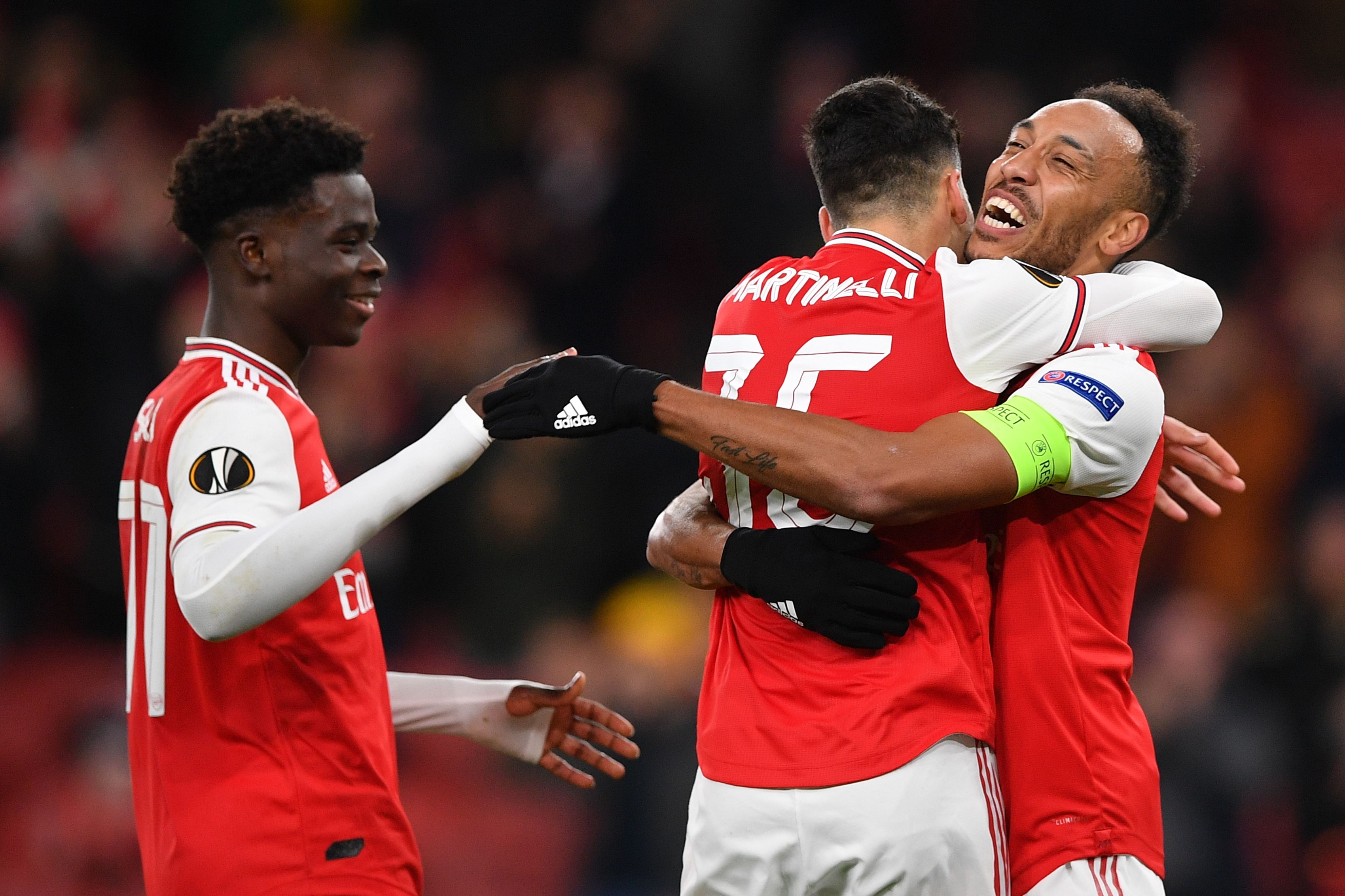 Arsenal's Gabonese striker Pierre-Emerick Aubameyang (R)bcelebrates scoring his team's first goal with Arsenal's Brazilian striker Gabriel Martinelli during their UEFA Europa league Group F football match between Arsenal and Eintracht Frankfurt at the Emirates stadium in London on November 28, 2019. (Photo by DANIEL LEAL-OLIVAS / AFP) (Photo by DANIEL LEAL-OLIVAS/AFP via Getty Images)