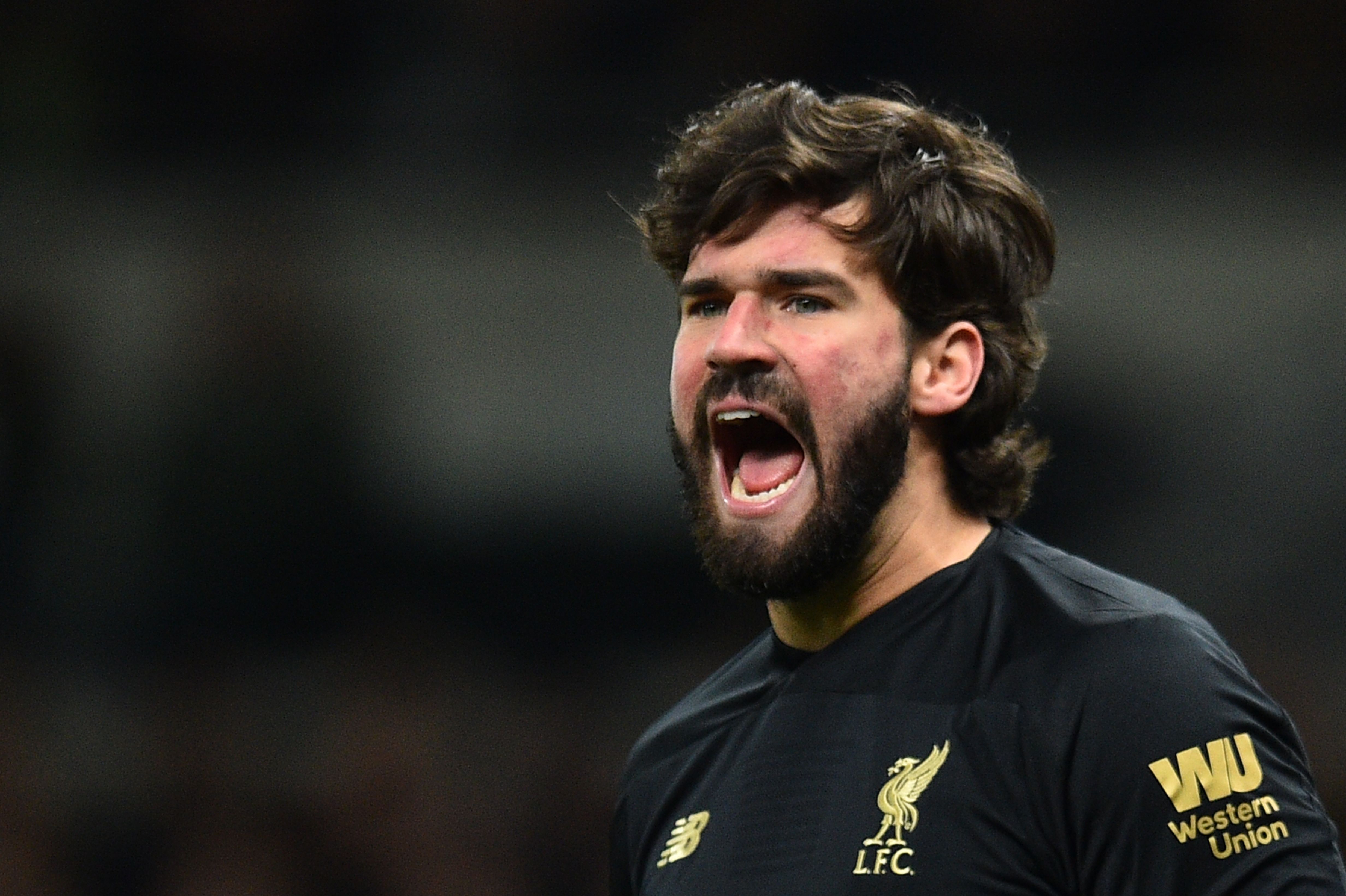 Liverpool will need Alisson at his commanding best against Chelsea. (Photo by Glyn Kirk/AFP via Getty Images)